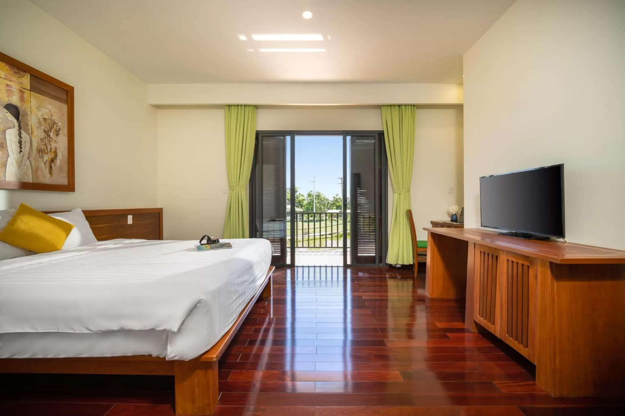 Bed, TV/Entertainment Center in Palm Village Hoian - STAY 24H