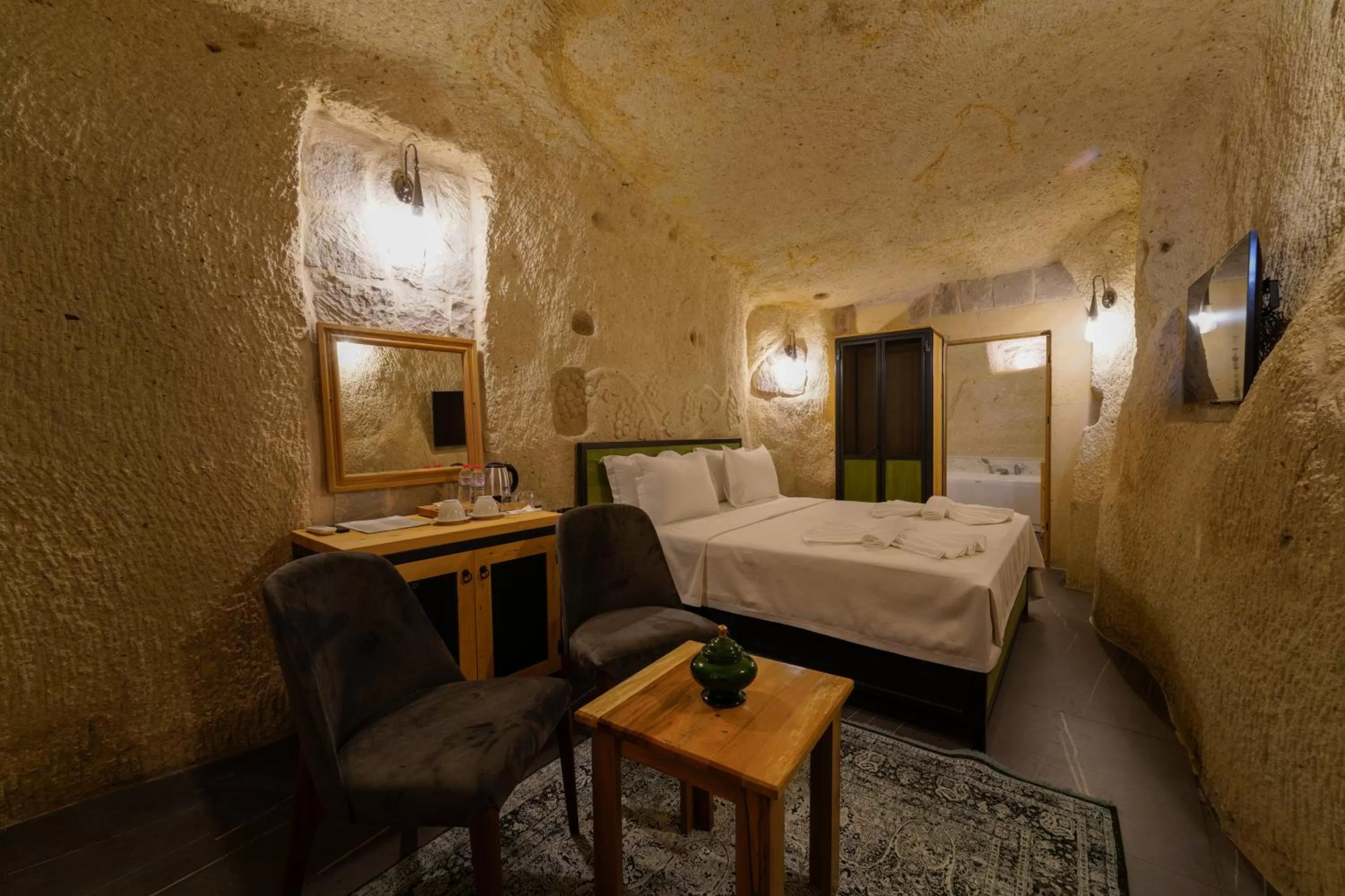 Bed in The Niche Cave Hotel