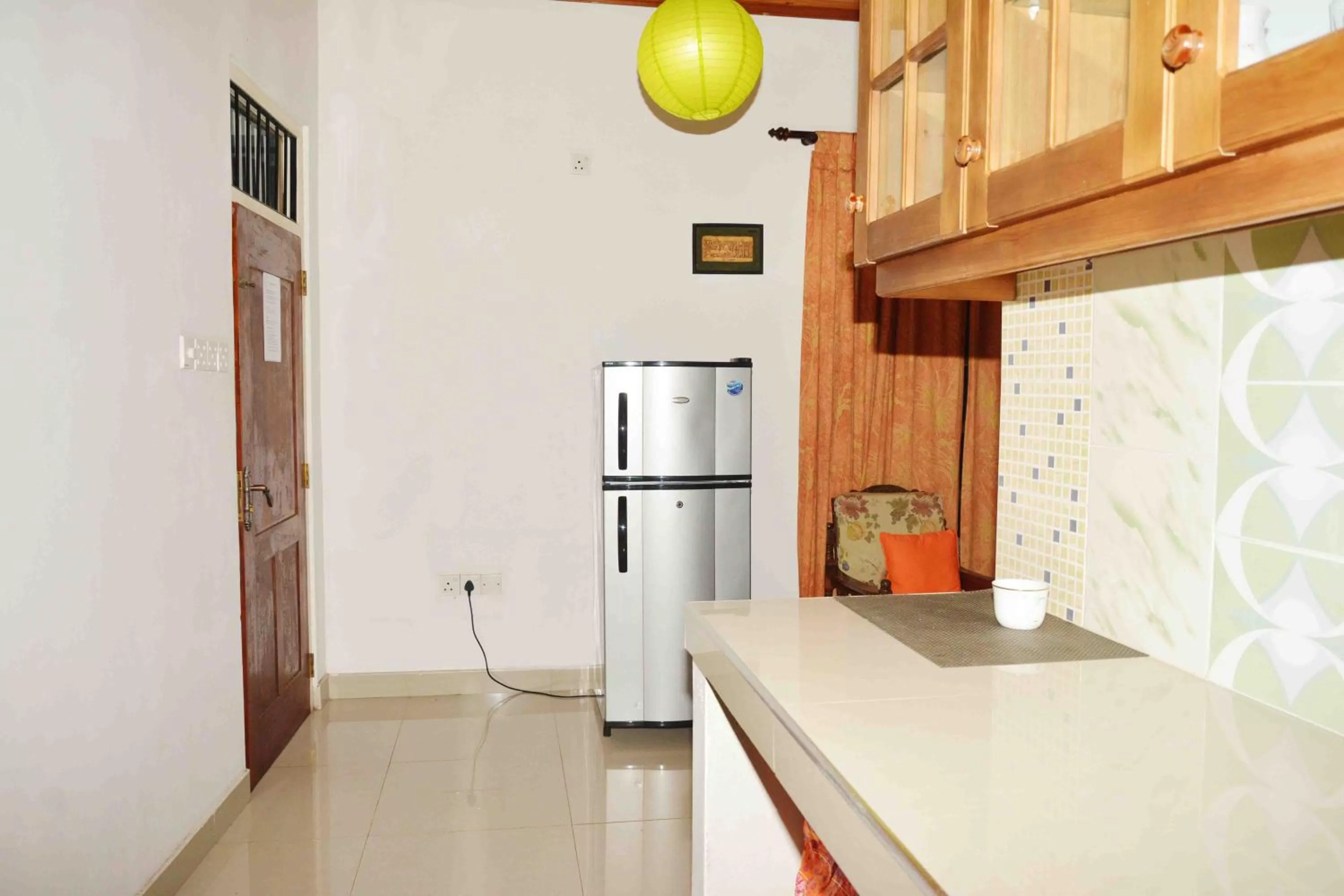 Kitchen or kitchenette in Sampathaa Residence
