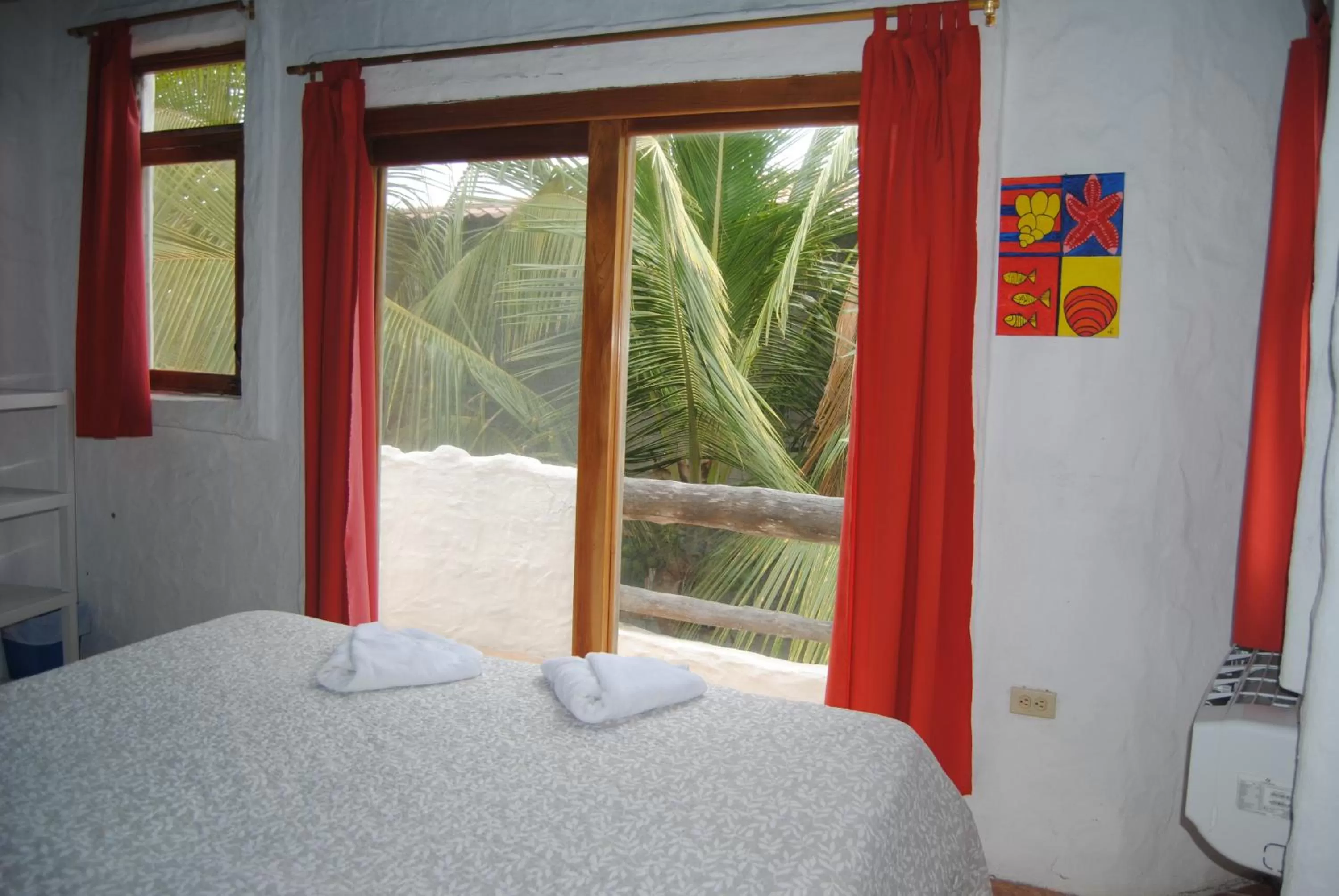 Bedroom, Bed in Hostal Galapagos by Bar de Beto