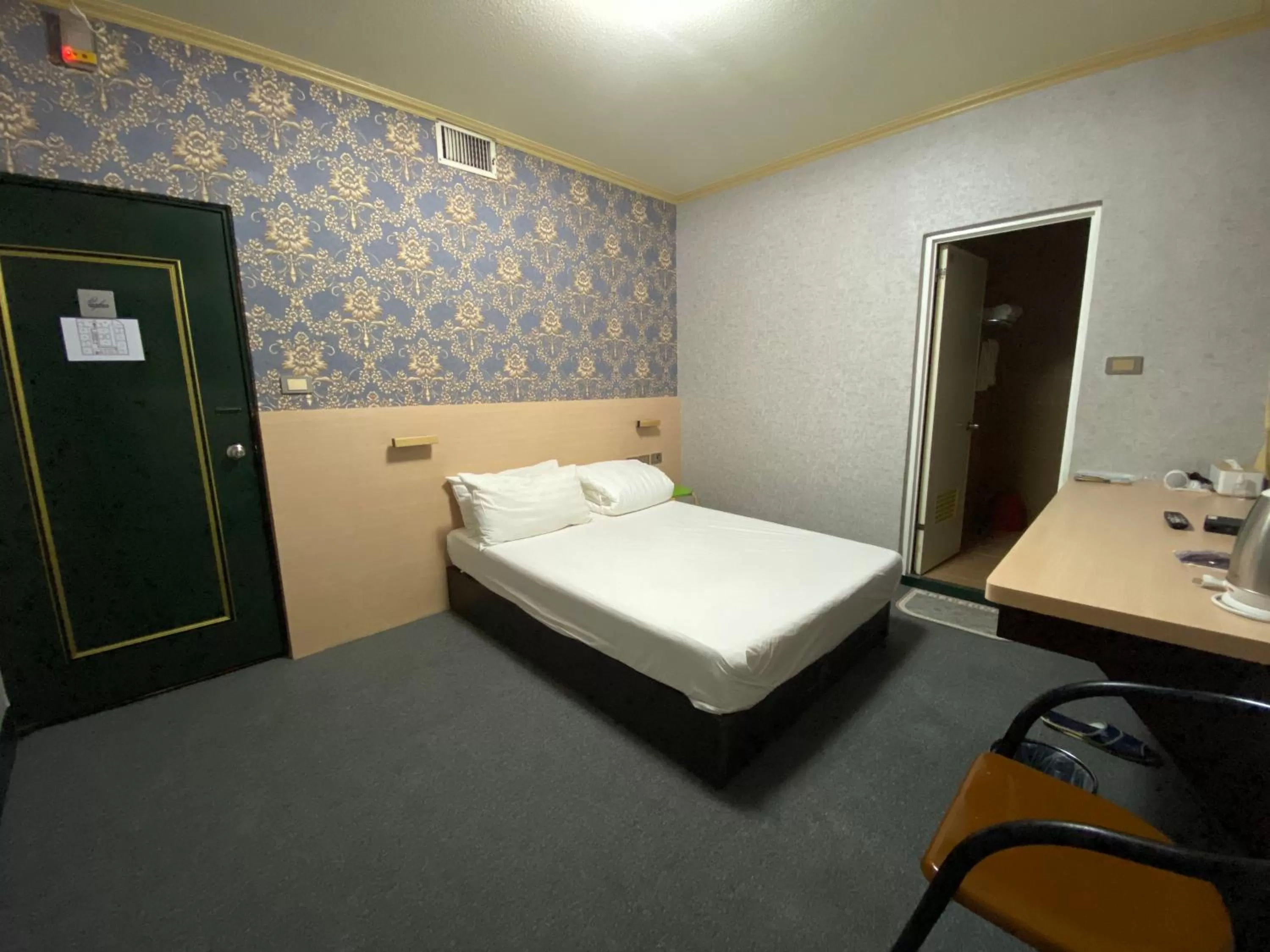 Photo of the whole room, Bed in Rich Zone Hotel