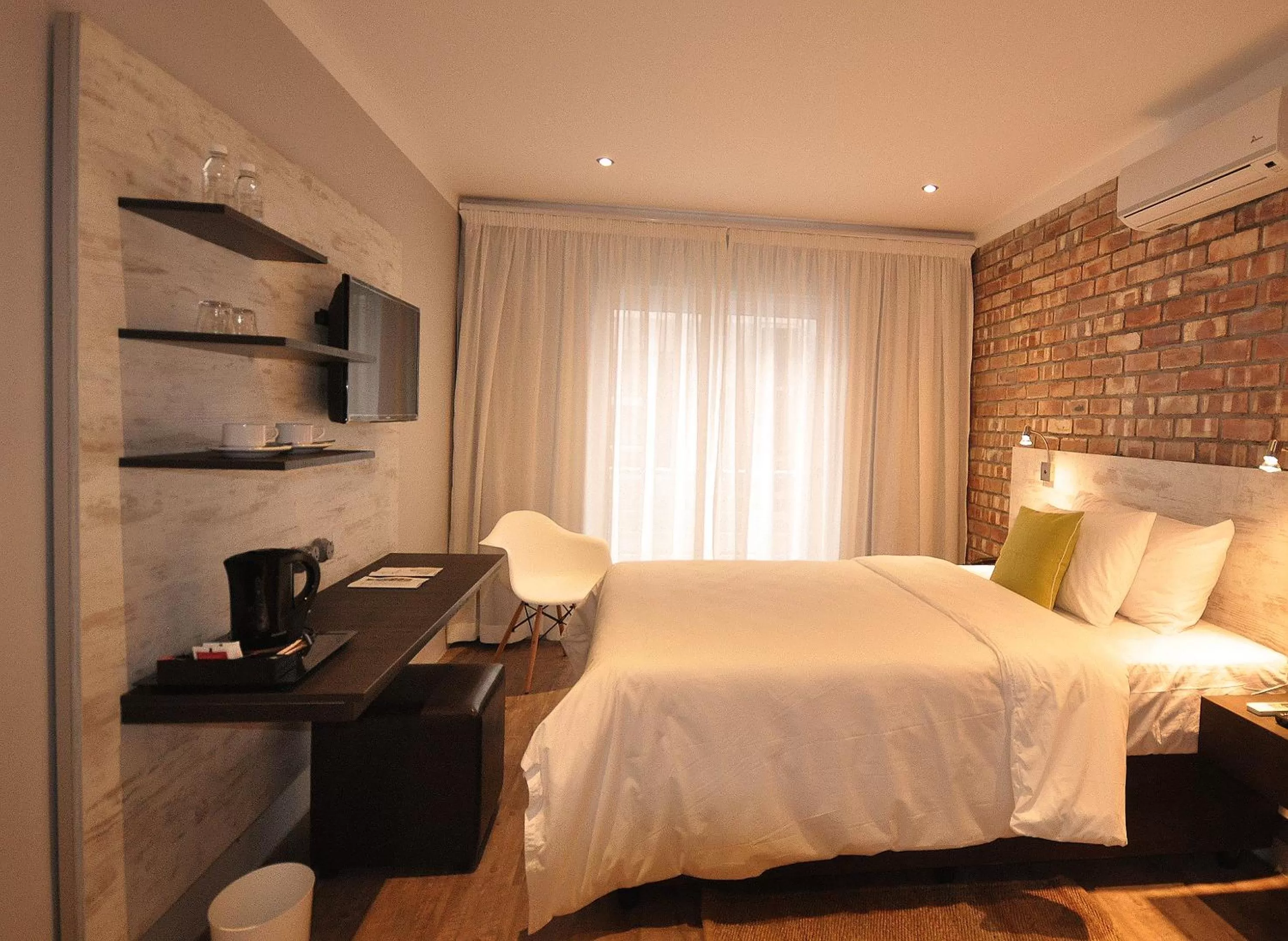 Photo of the whole room, Bed in Swakopmund Plaza Hotel