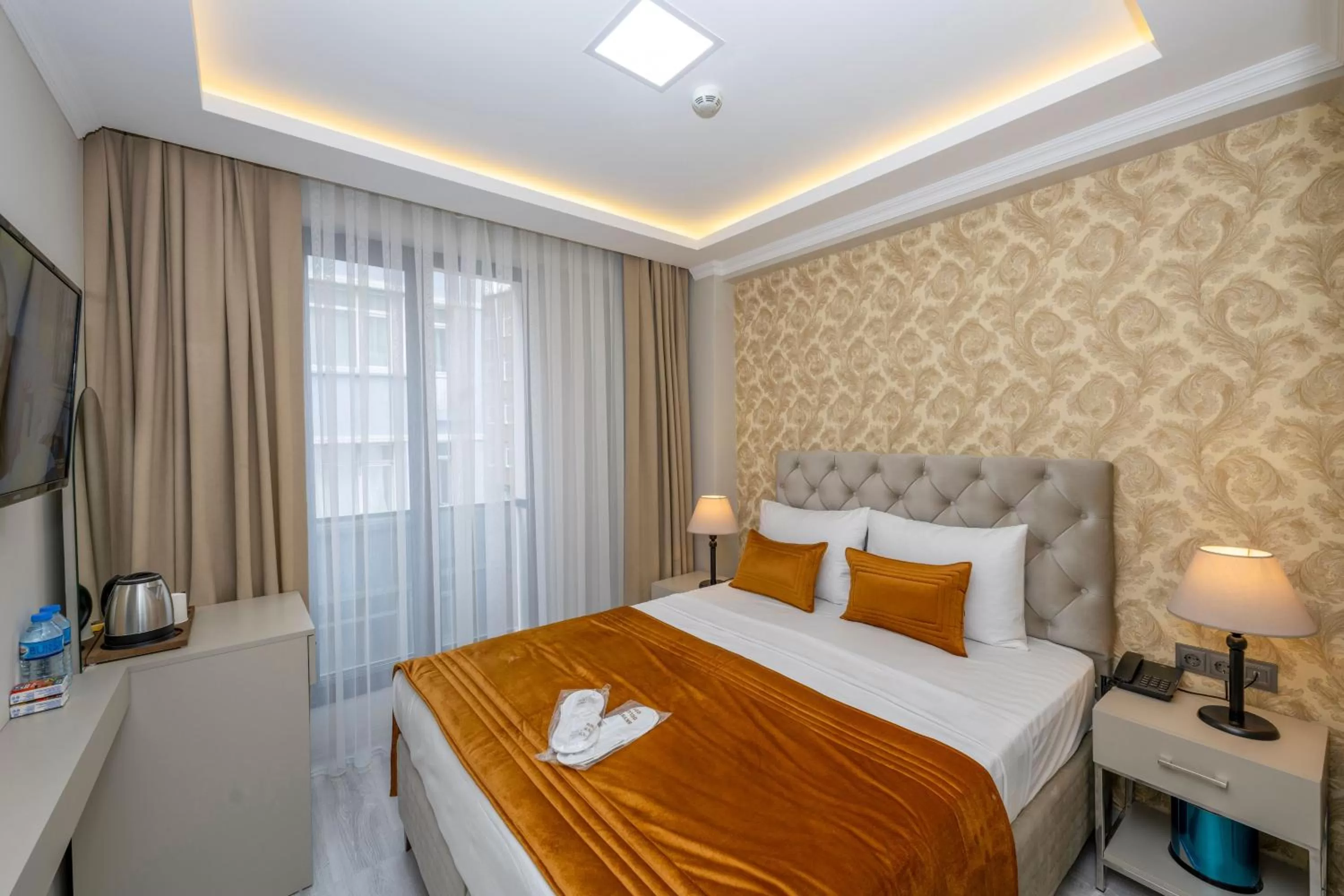 Bed in SKYSTAR DELUXE HOTEL