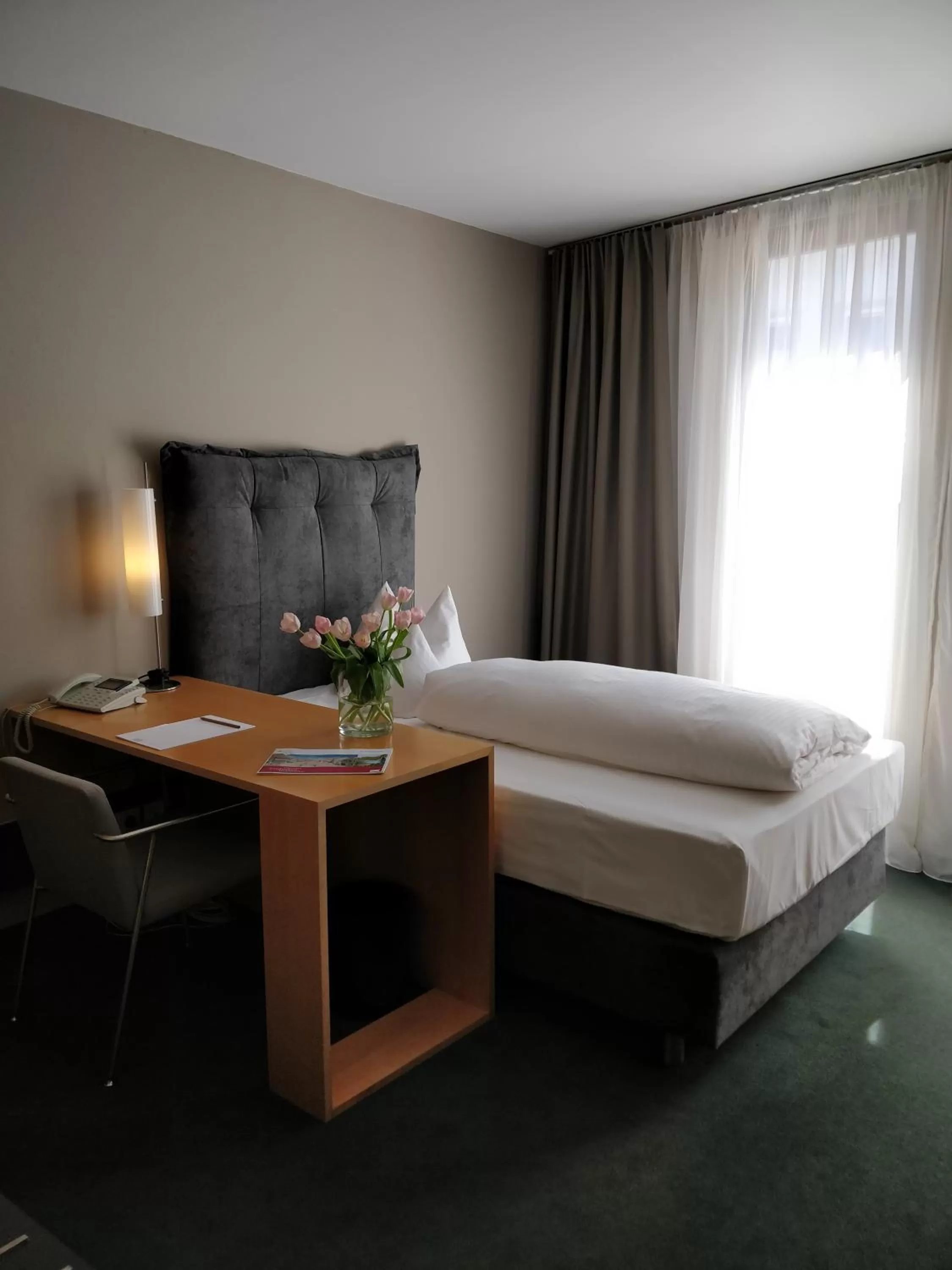 Bed in Hotel an der Stadtmauer