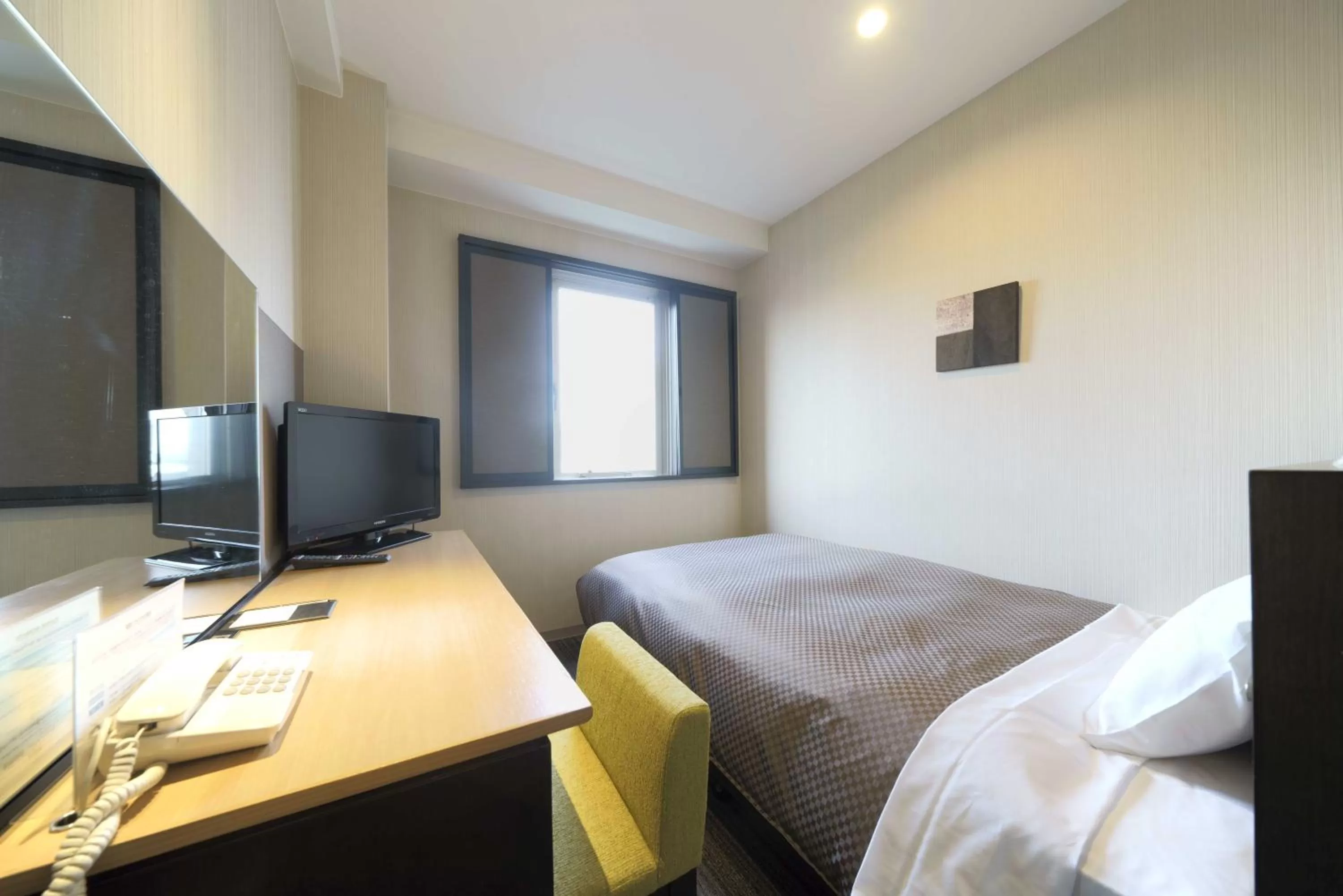 Photo of the whole room, Bed in Meitetsu Inn Kariya