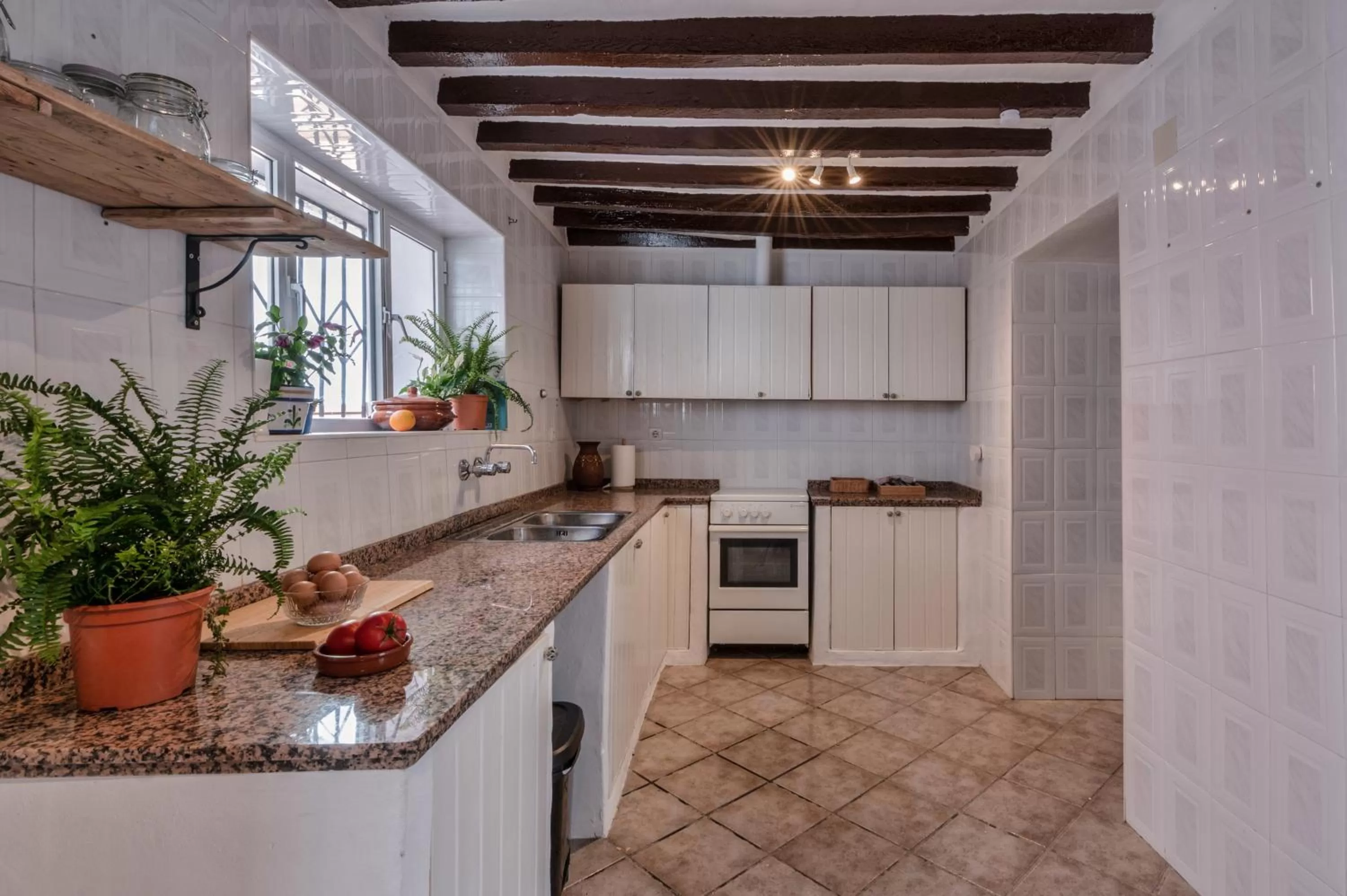 kitchen in Encanto Guesthouse