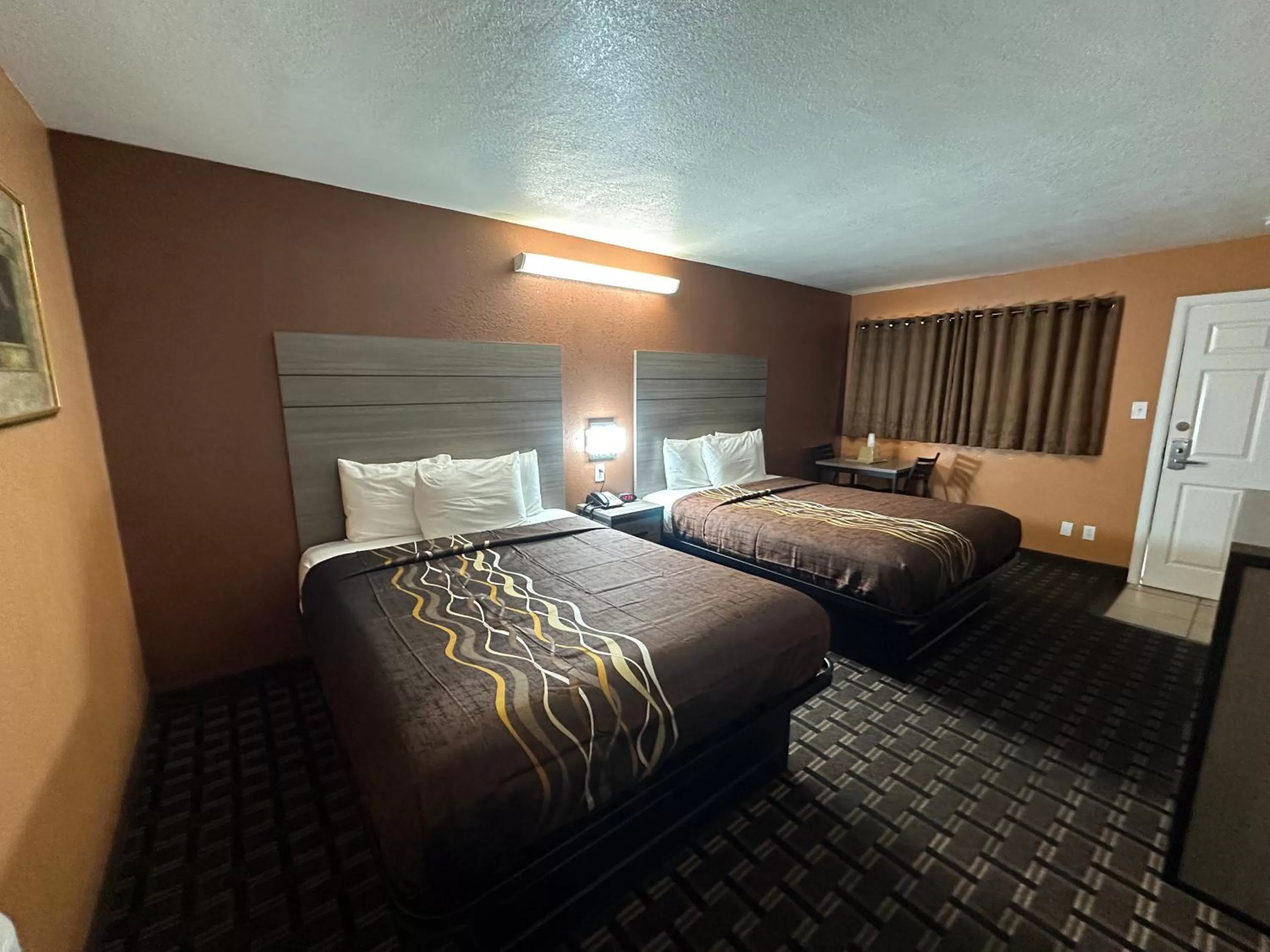 Bed in New Corral Motel