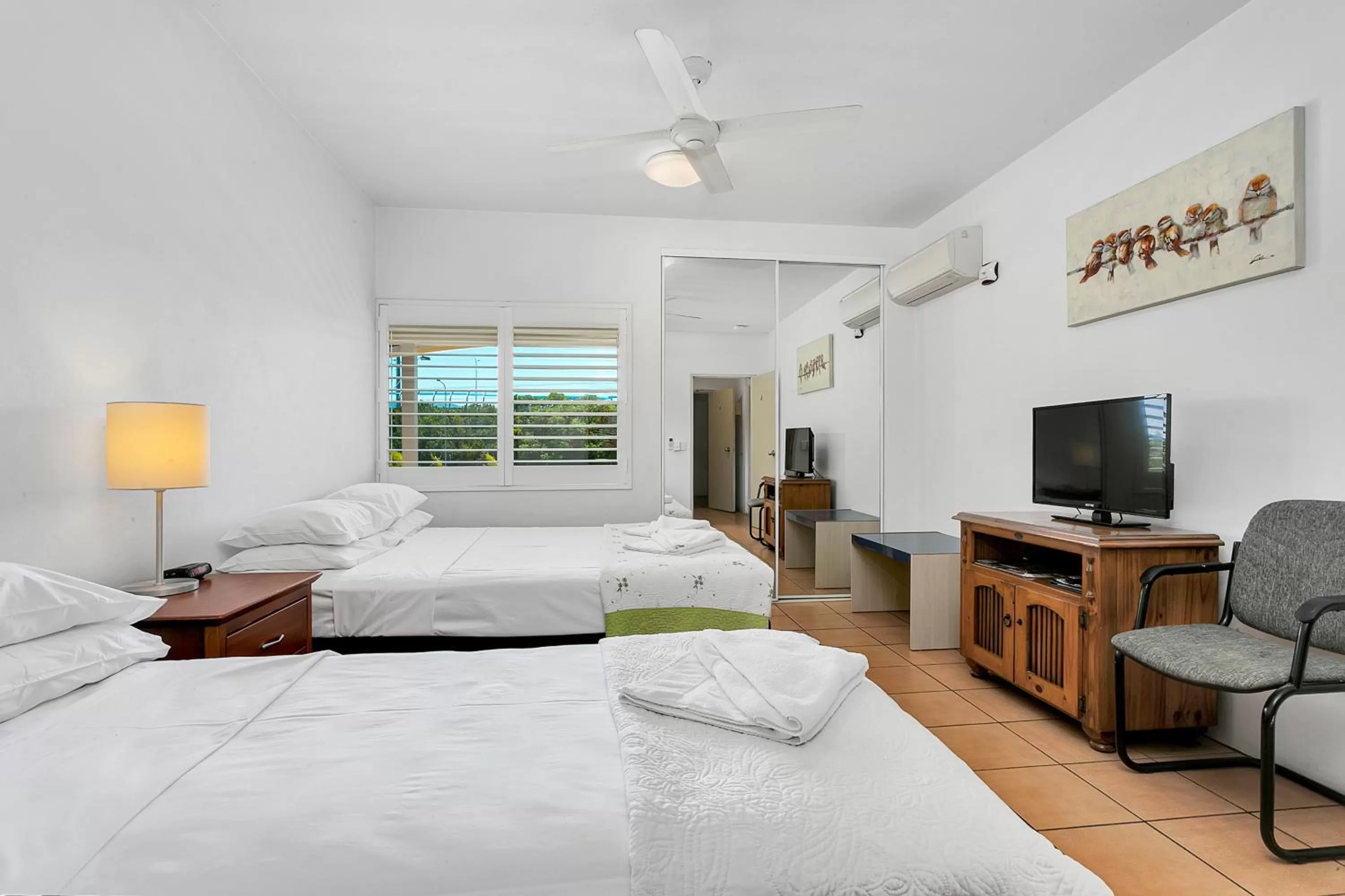 Bedroom, Bed in Cairns Reef Apartments & Motel