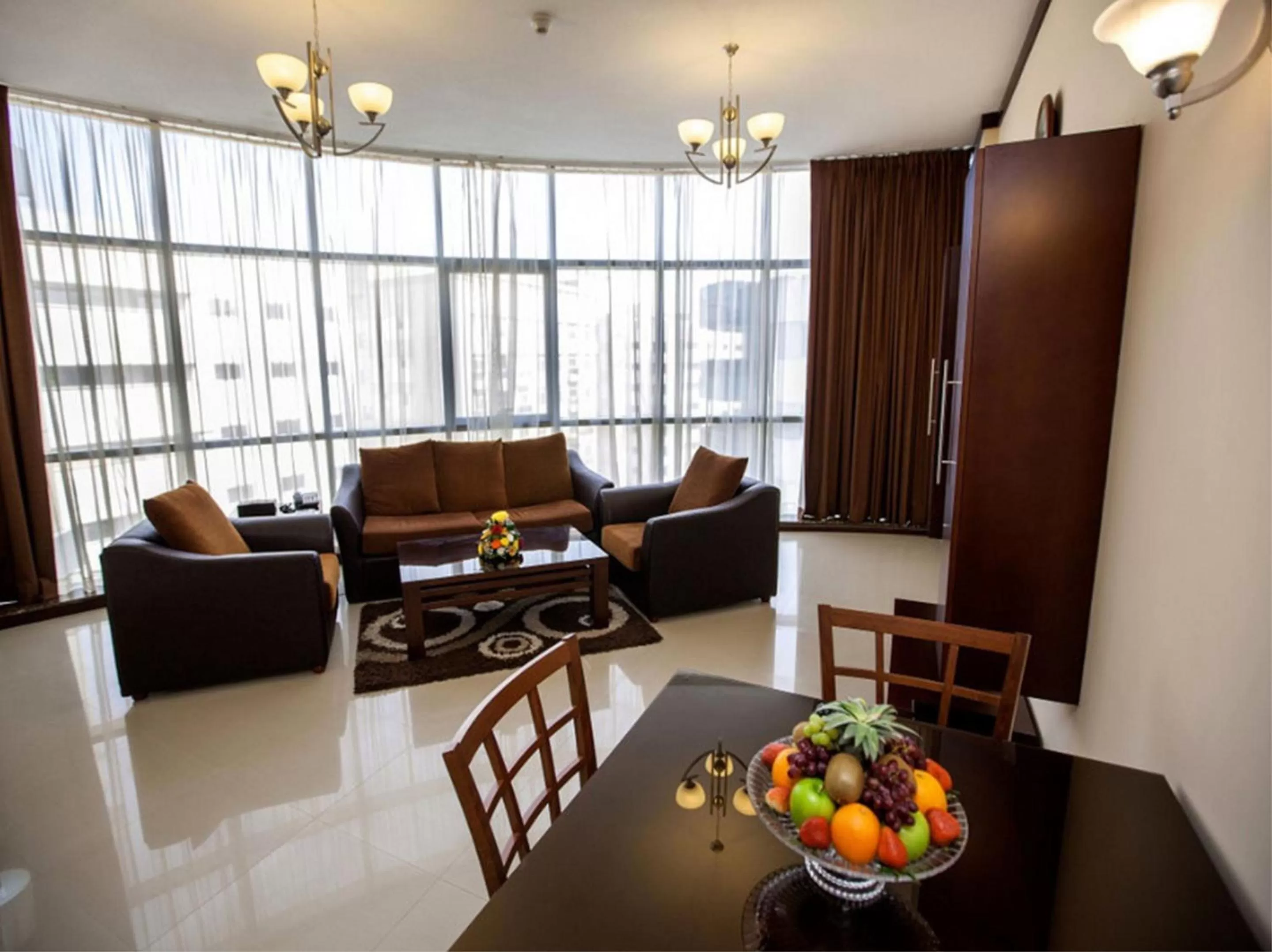Living room in Xclusive Maples Hotel Apartment