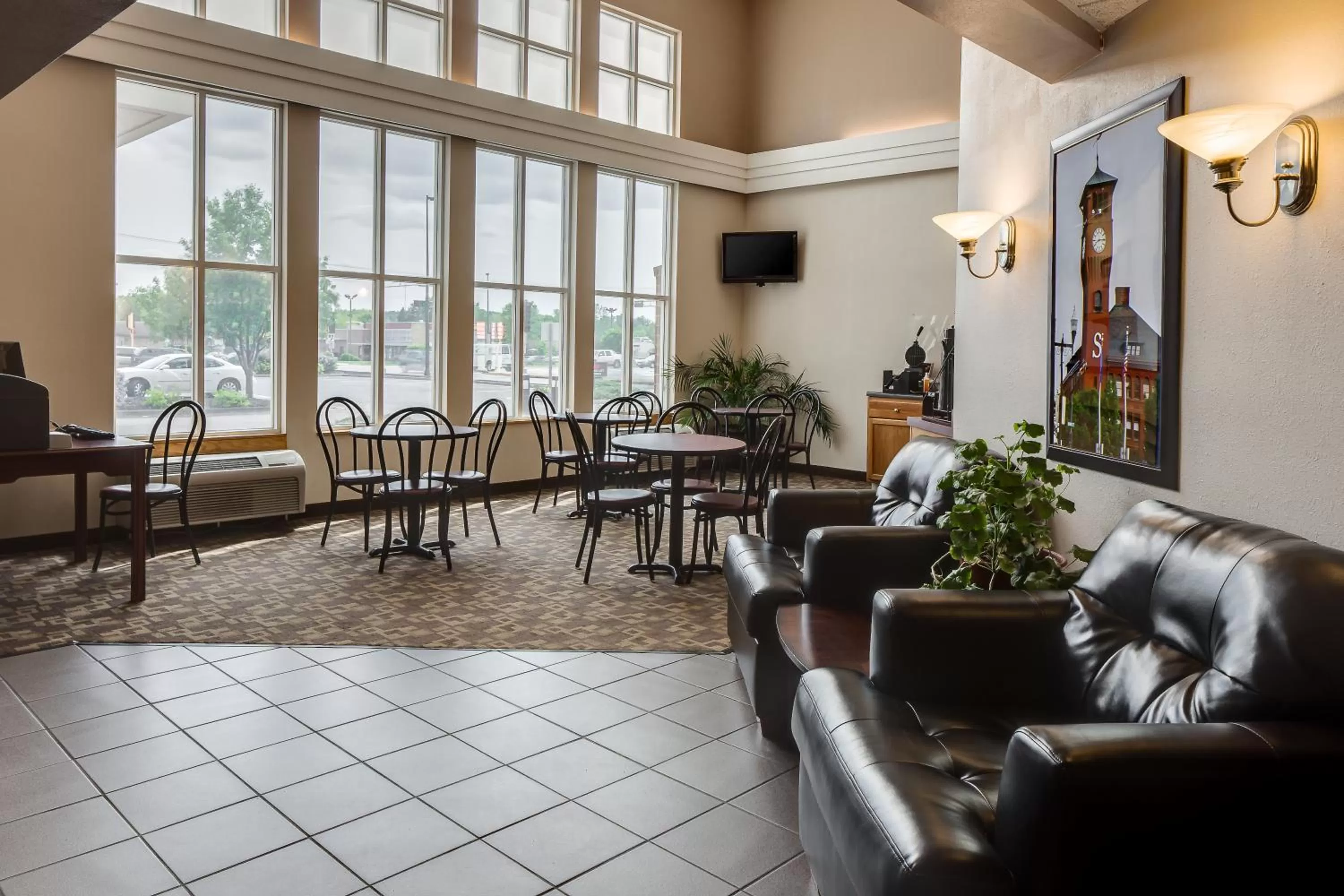 Lobby or reception in Super 8 by Wyndham Menomonie WI
