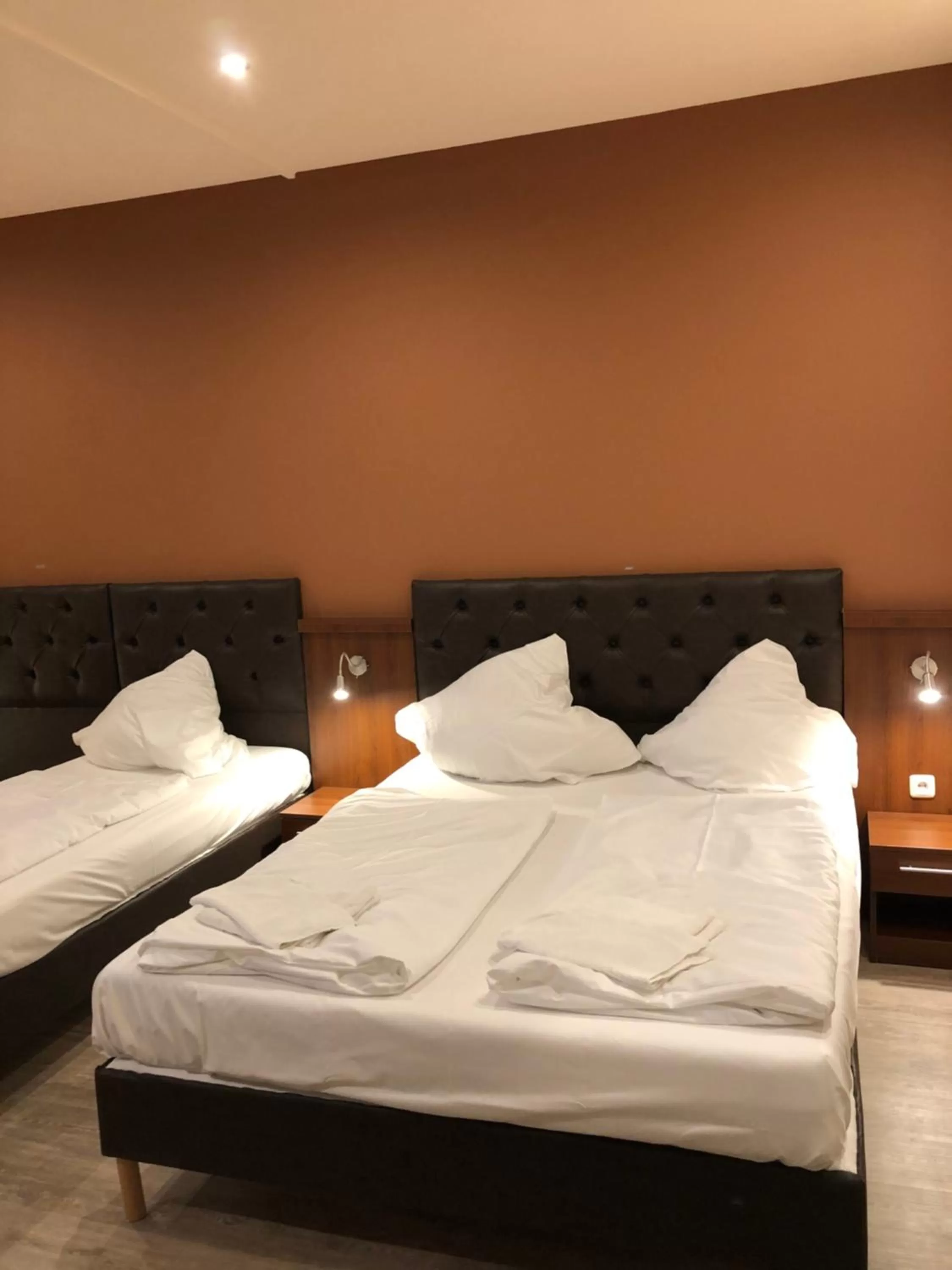 Bed in Hotel Poseidon