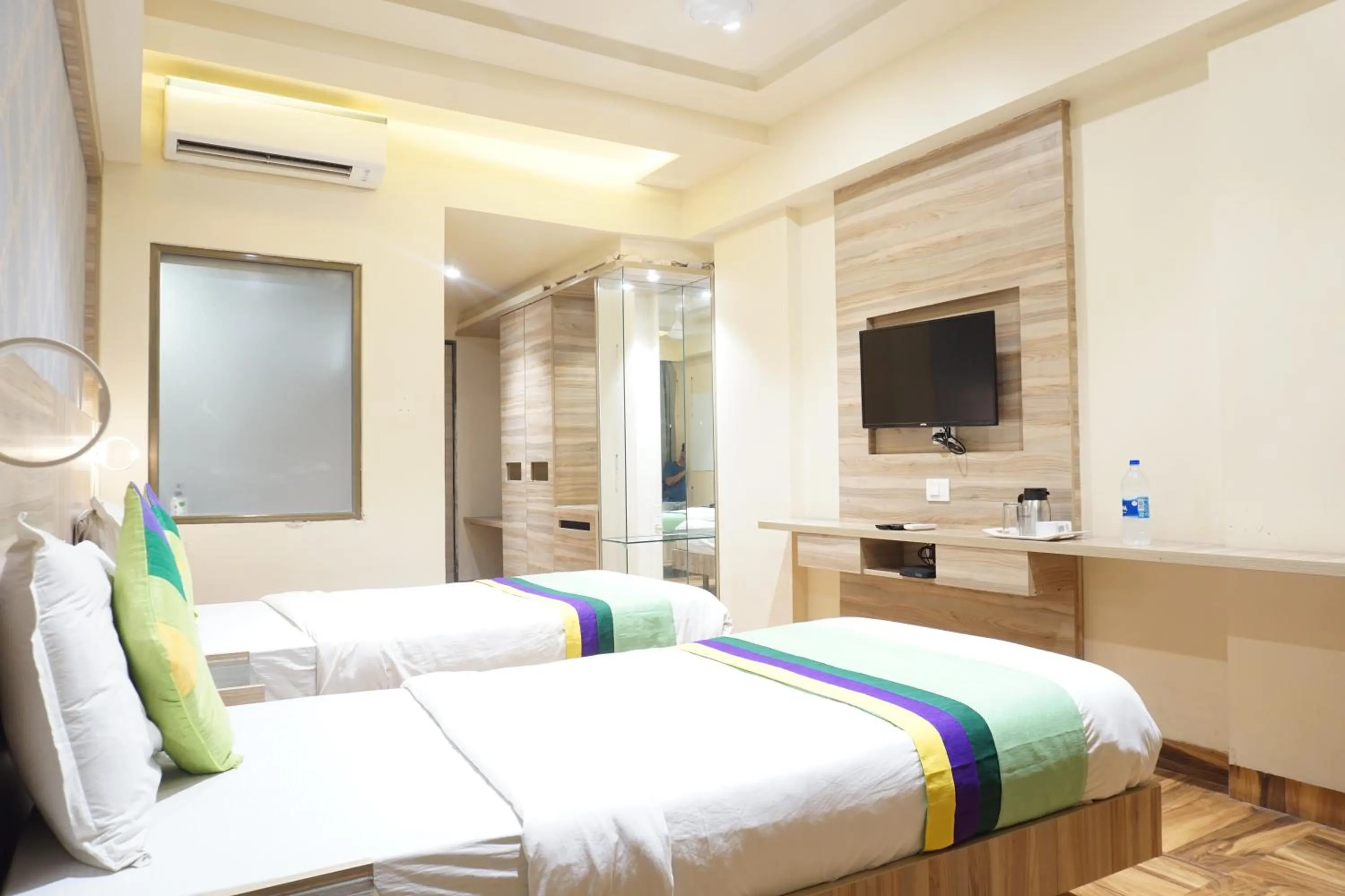 Bedroom, Bed in Treebo Classic Grande, Camp