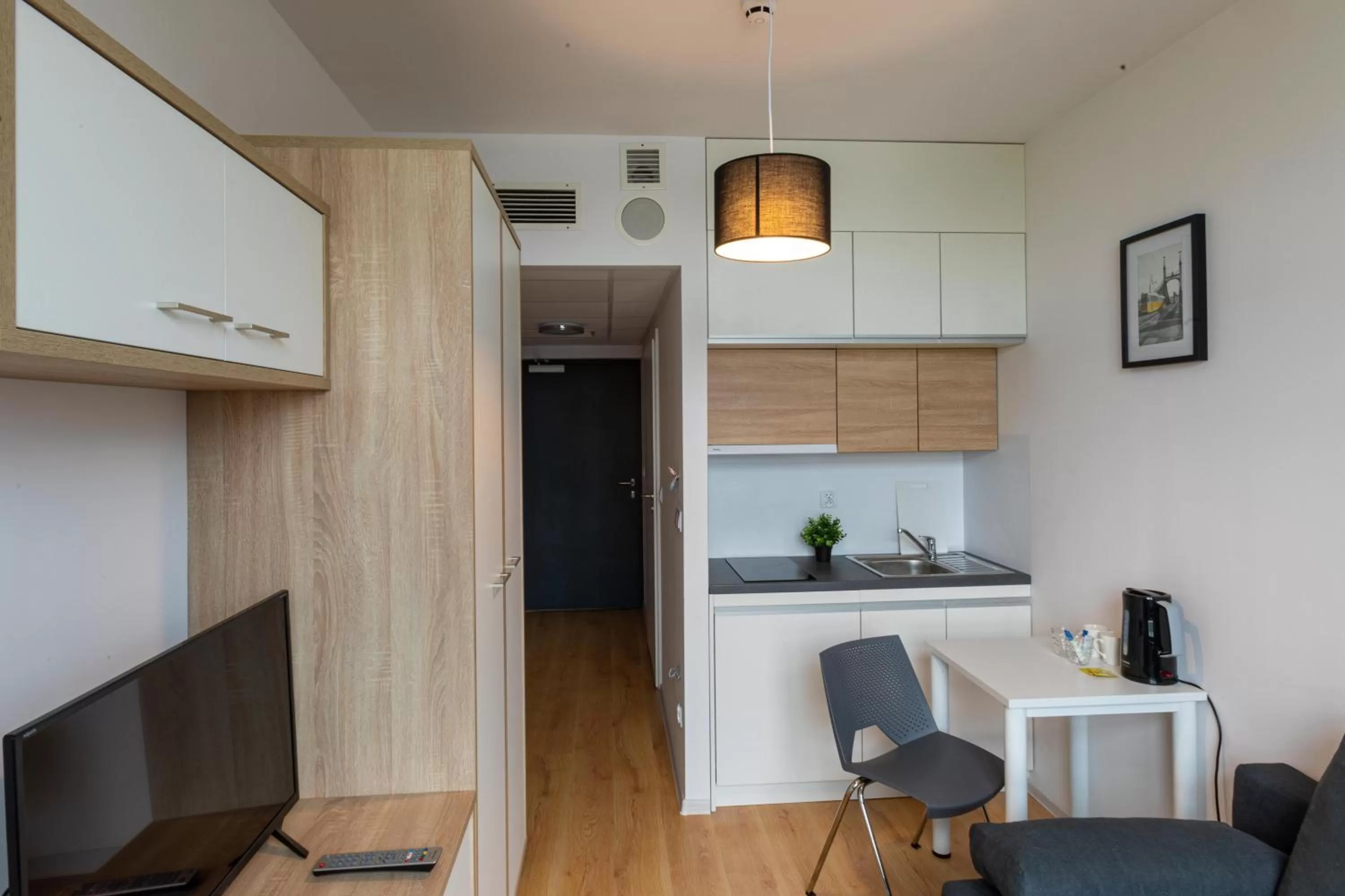 Kitchen or kitchenette in SleepWell Apartments