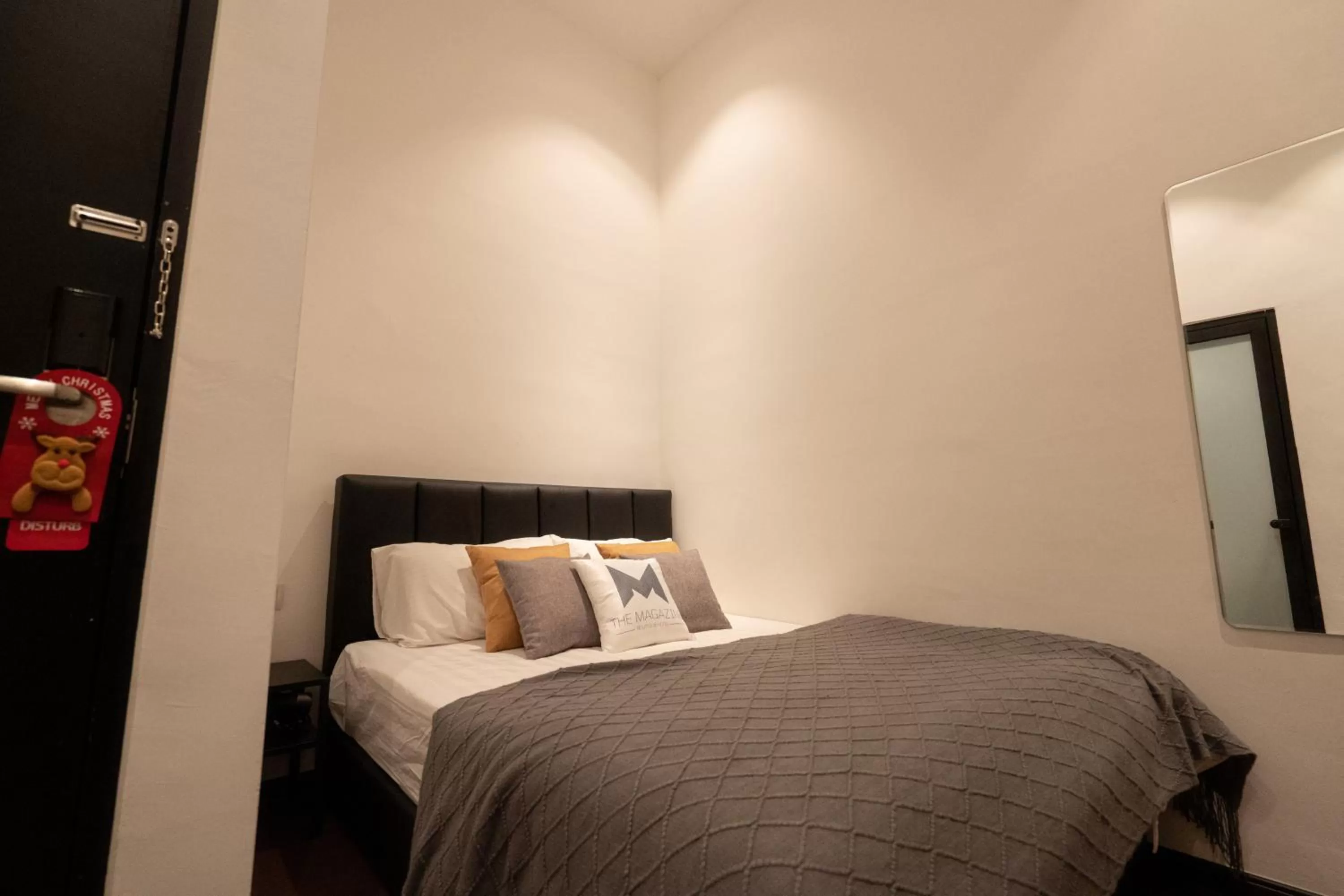 Bed in The Magazine Boutique Hotel