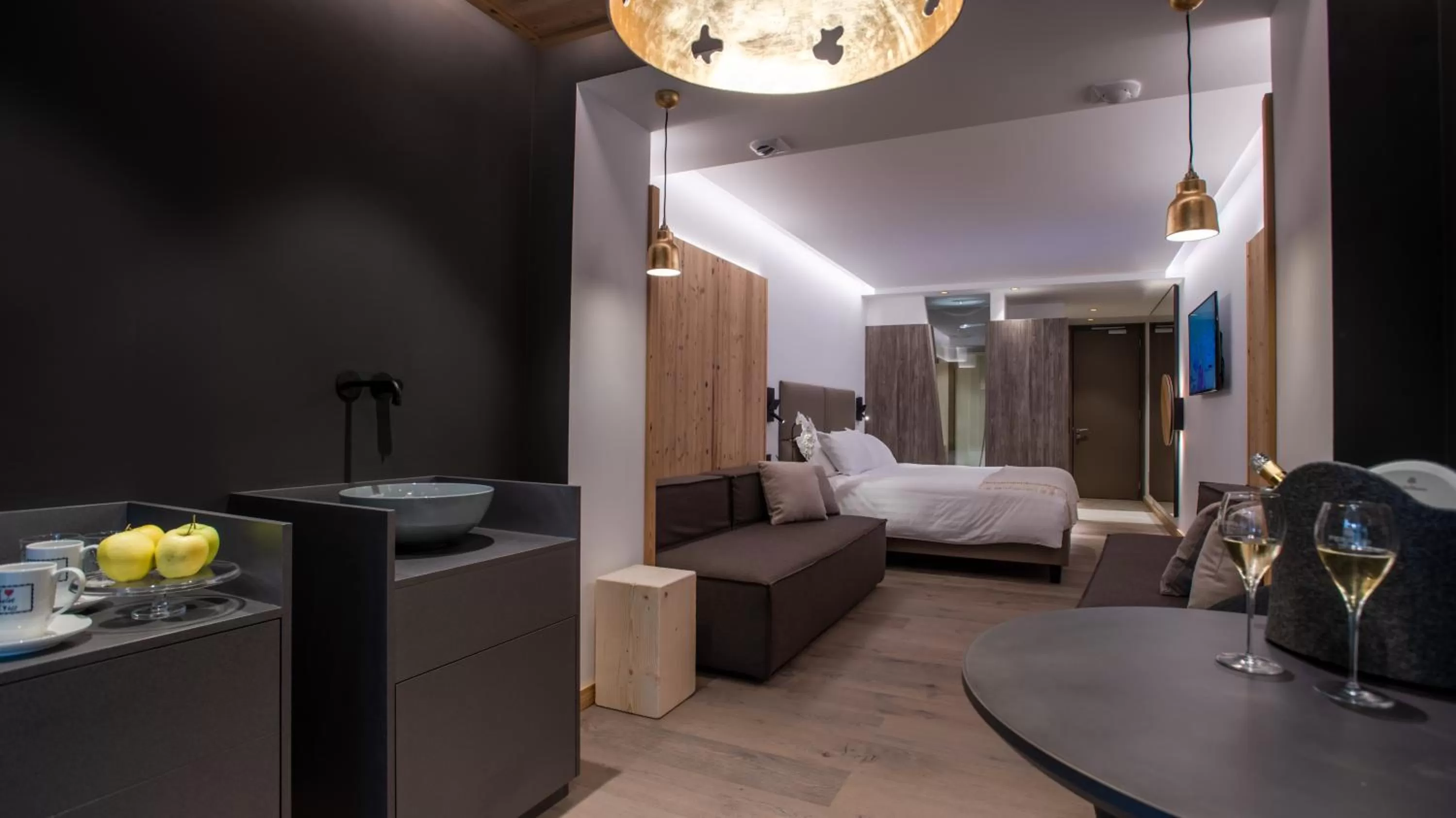 Seating area, Bed in Hotel Chalet Al Foss - Adults Only