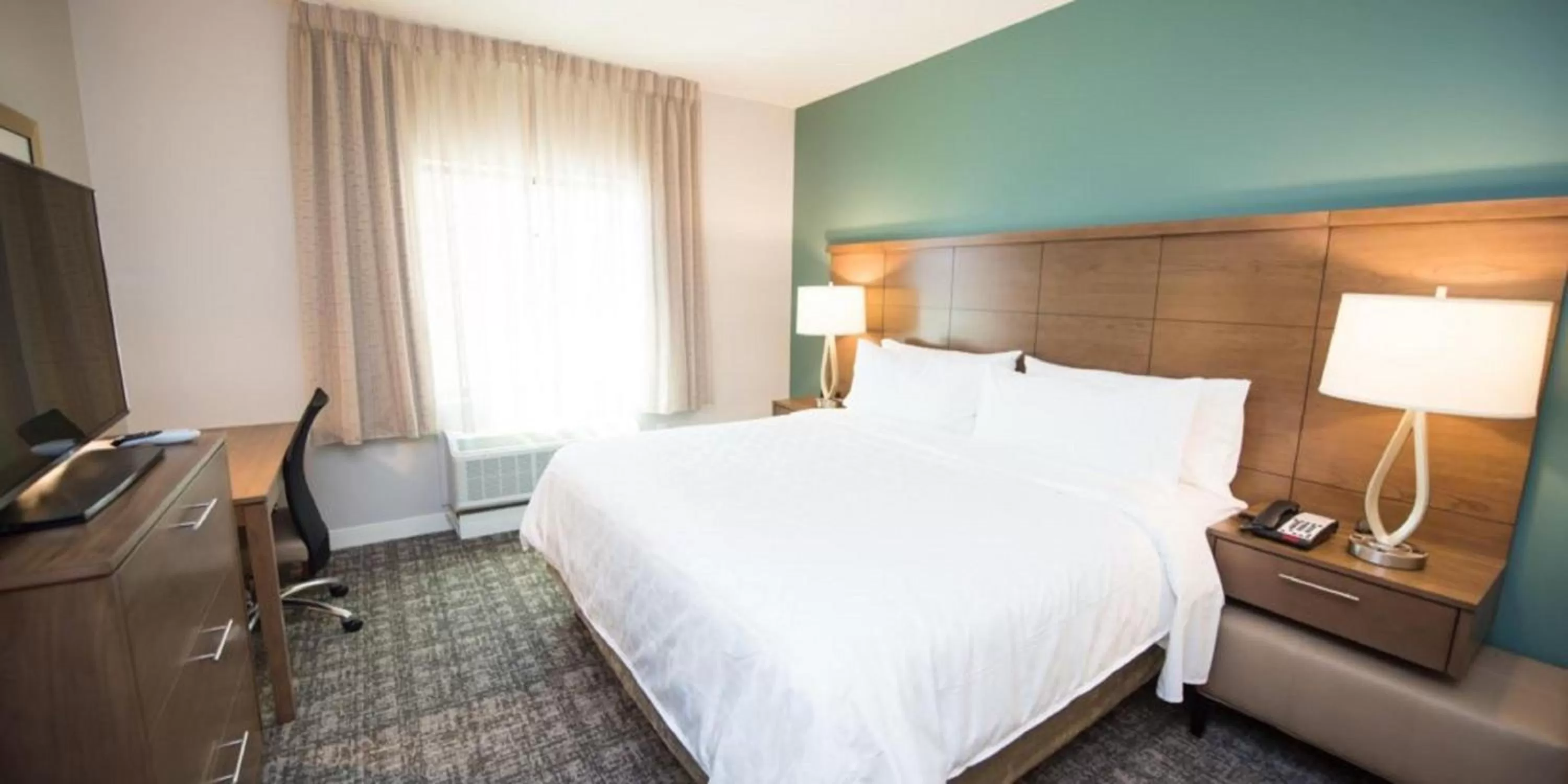Photo of the whole room, Bed in Staybridge Suites Houston East - Baytown by IHG