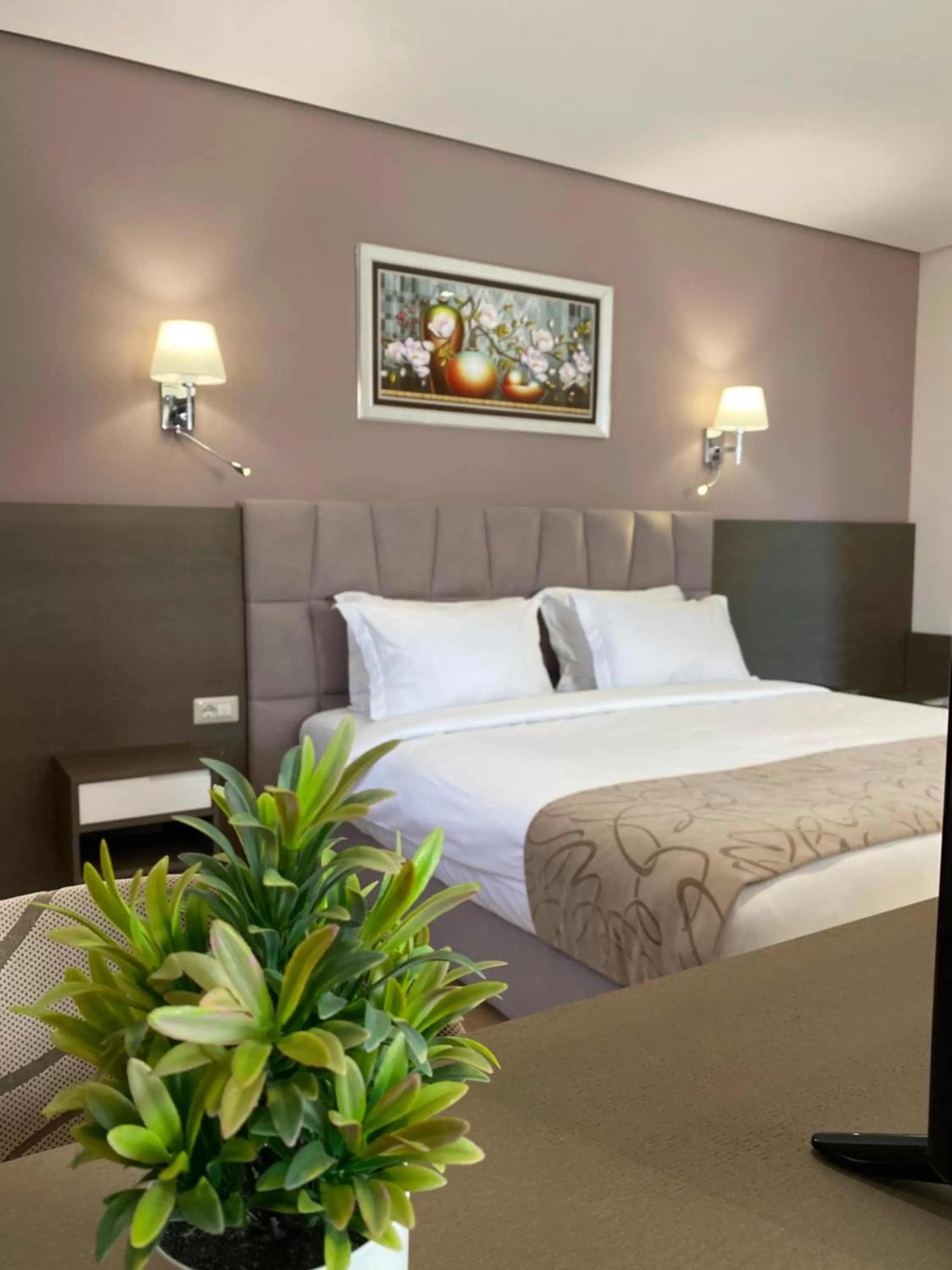 Bed in Doanesia Premium Hotel & Spa