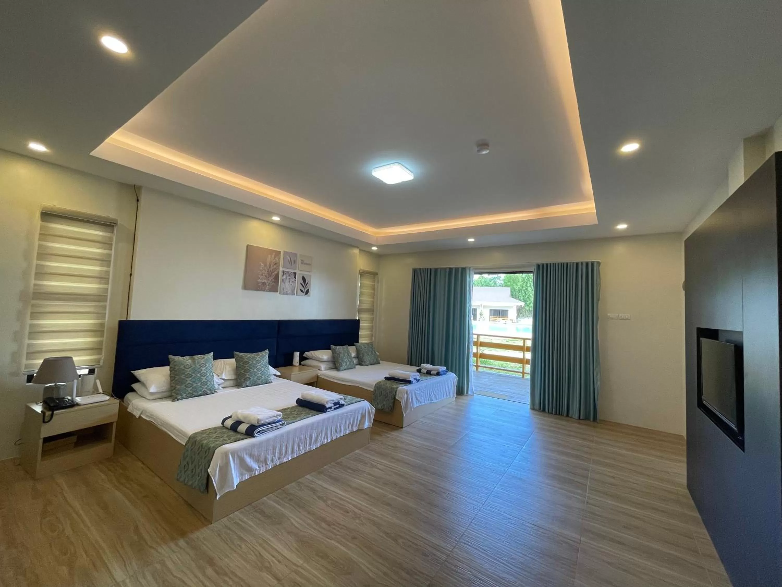 Bed in FIG Sunset View Resort