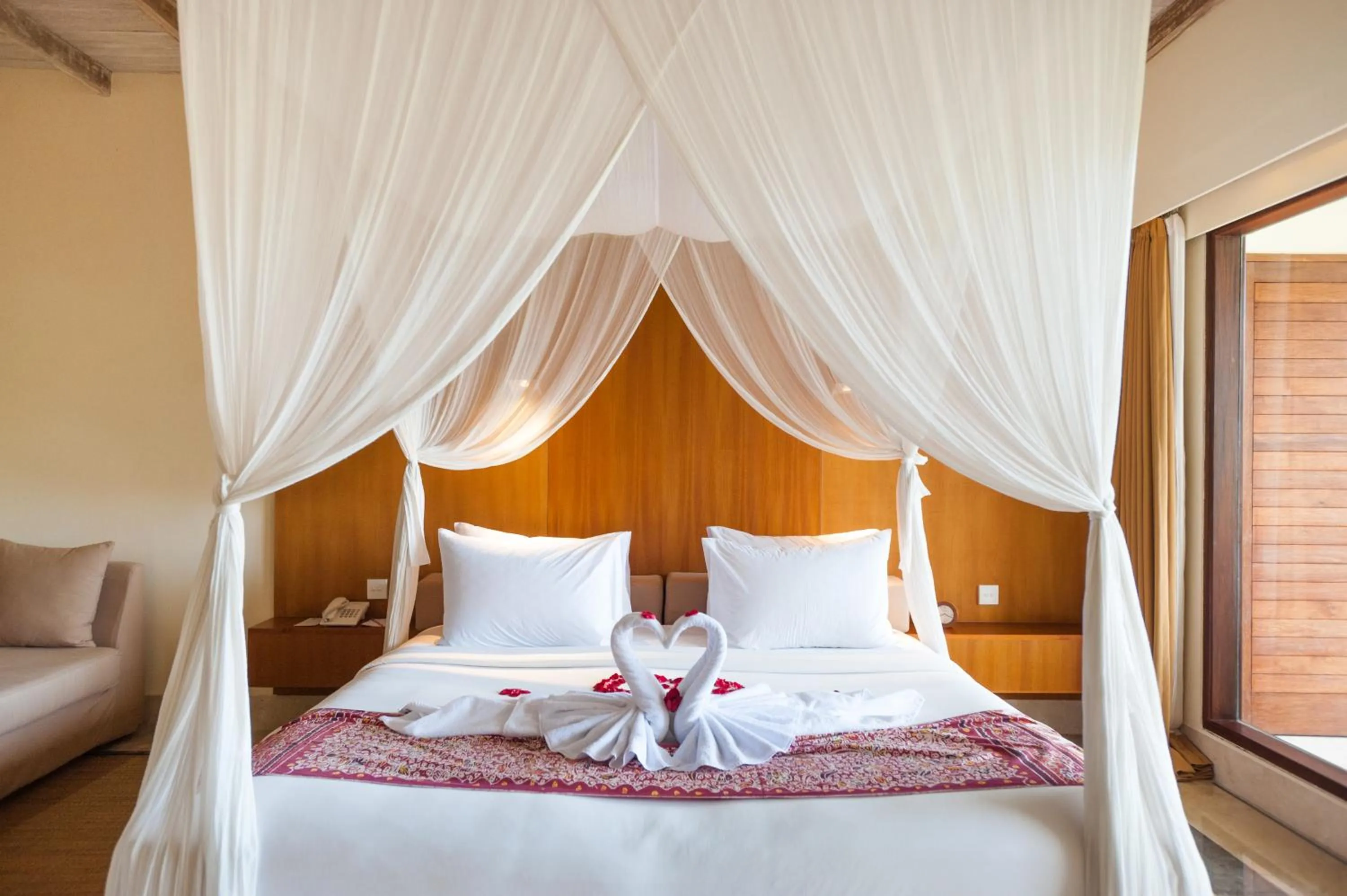 Bed in Komaneka at Monkey Forest Ubud