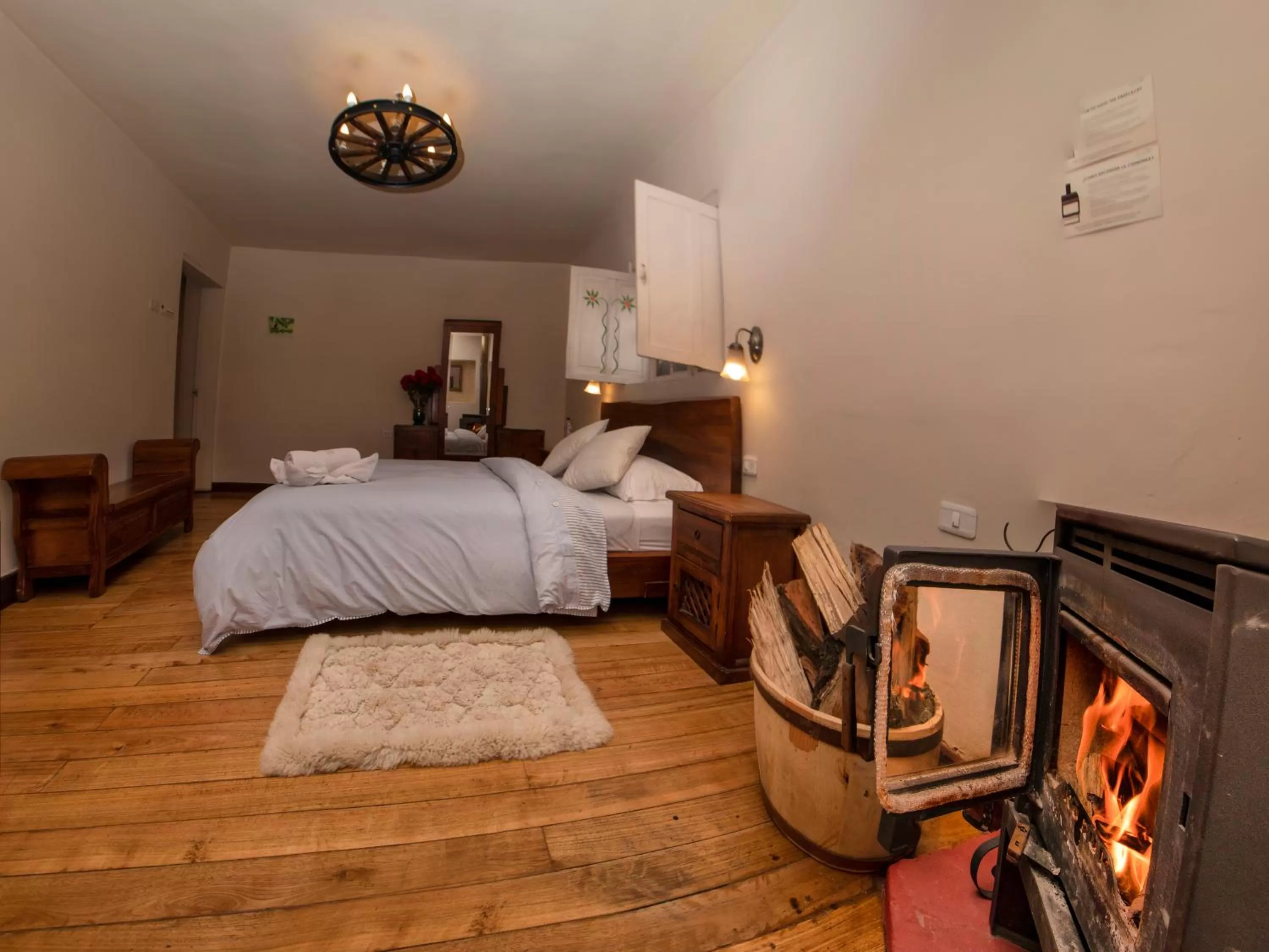 Bed in Hosteria Papagayo Cotopaxi