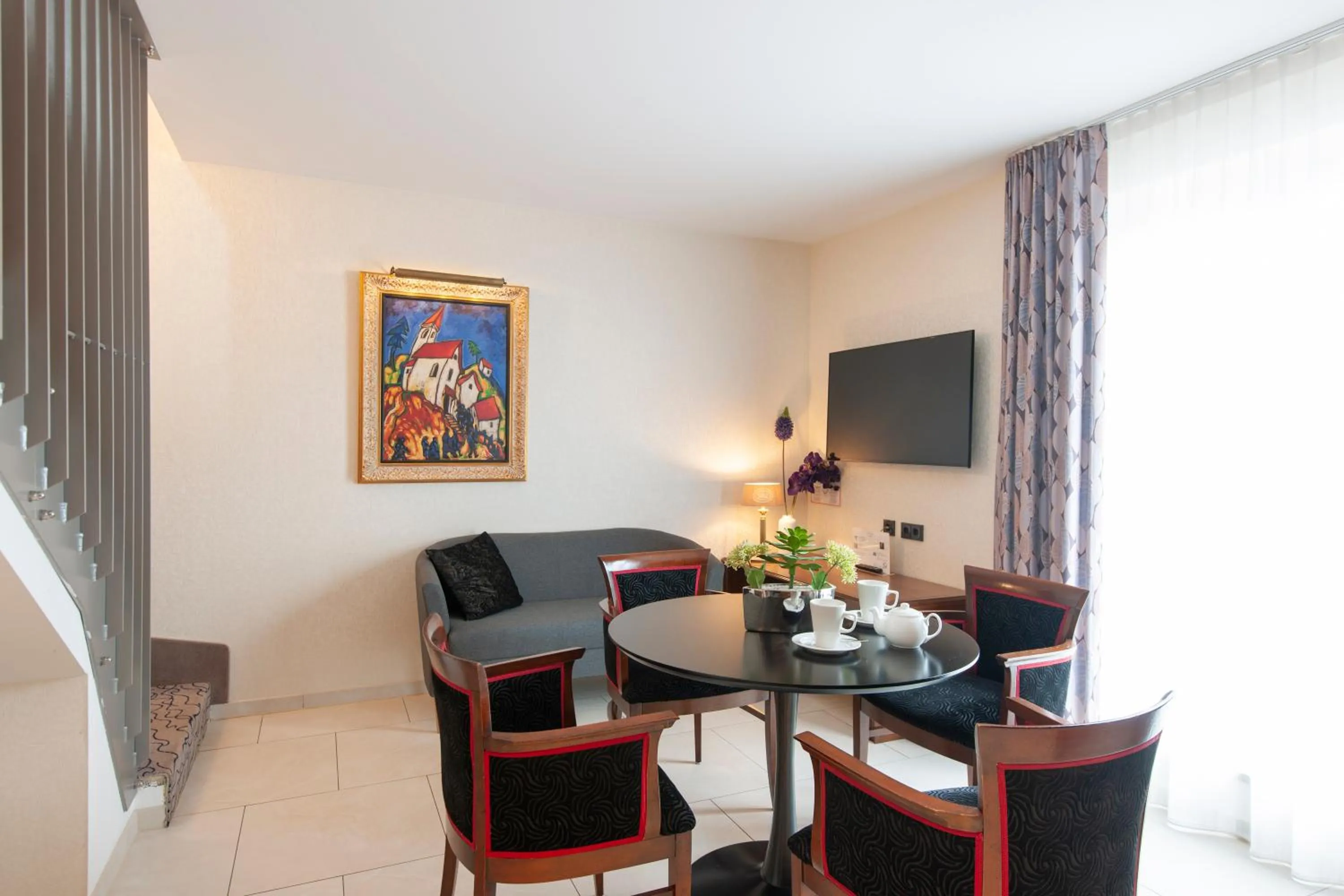 Seating area in AdvaStay by KING's