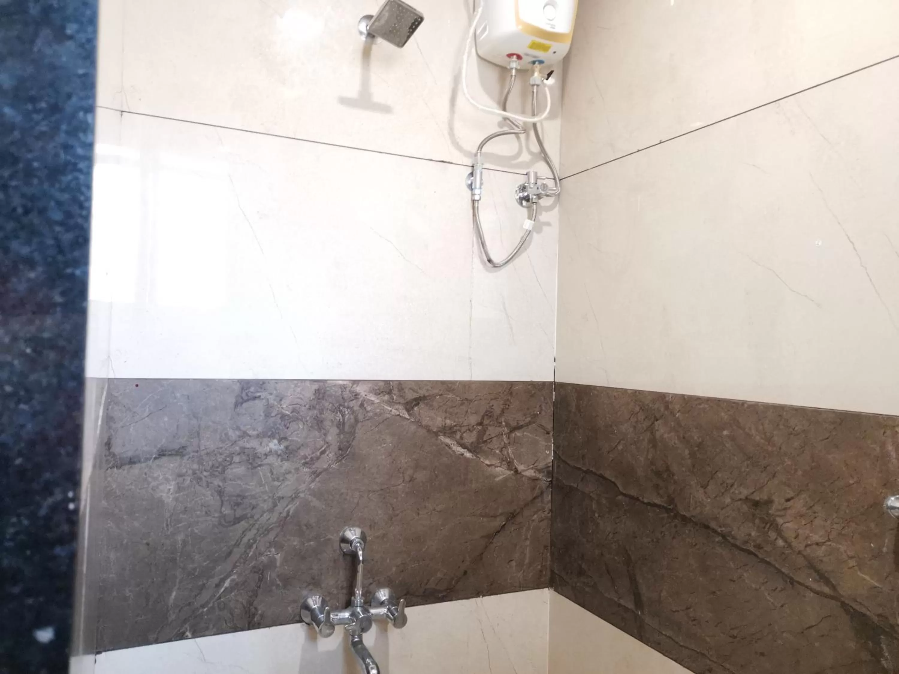 Premium Quadruple Room in Mahalaxmi Executive