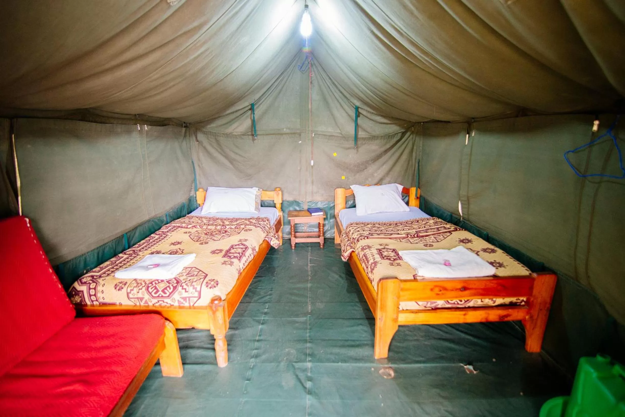 Bed in Bunyonyi Overland Resort