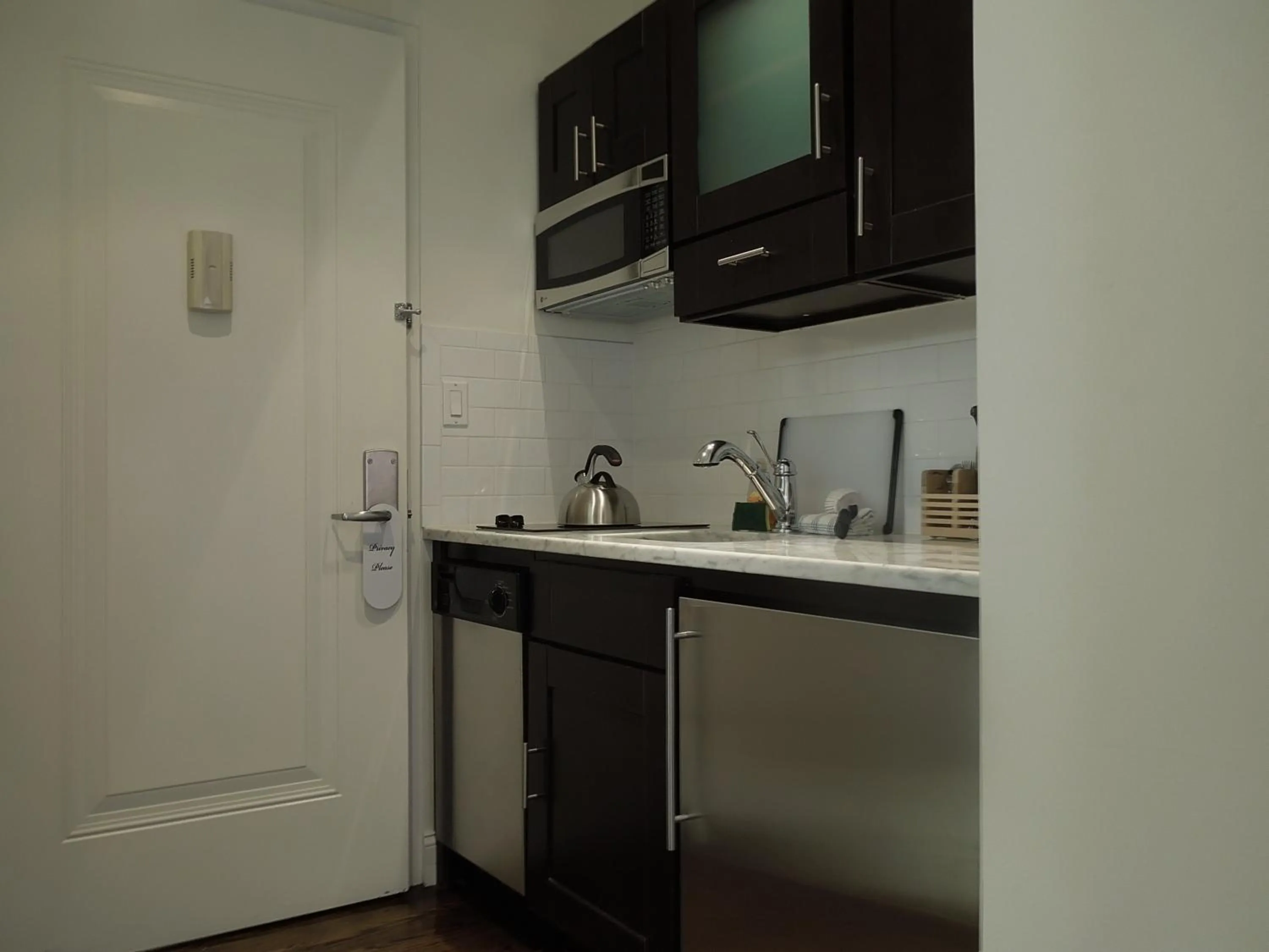 Kitchen or kitchenette in East Village Hotel