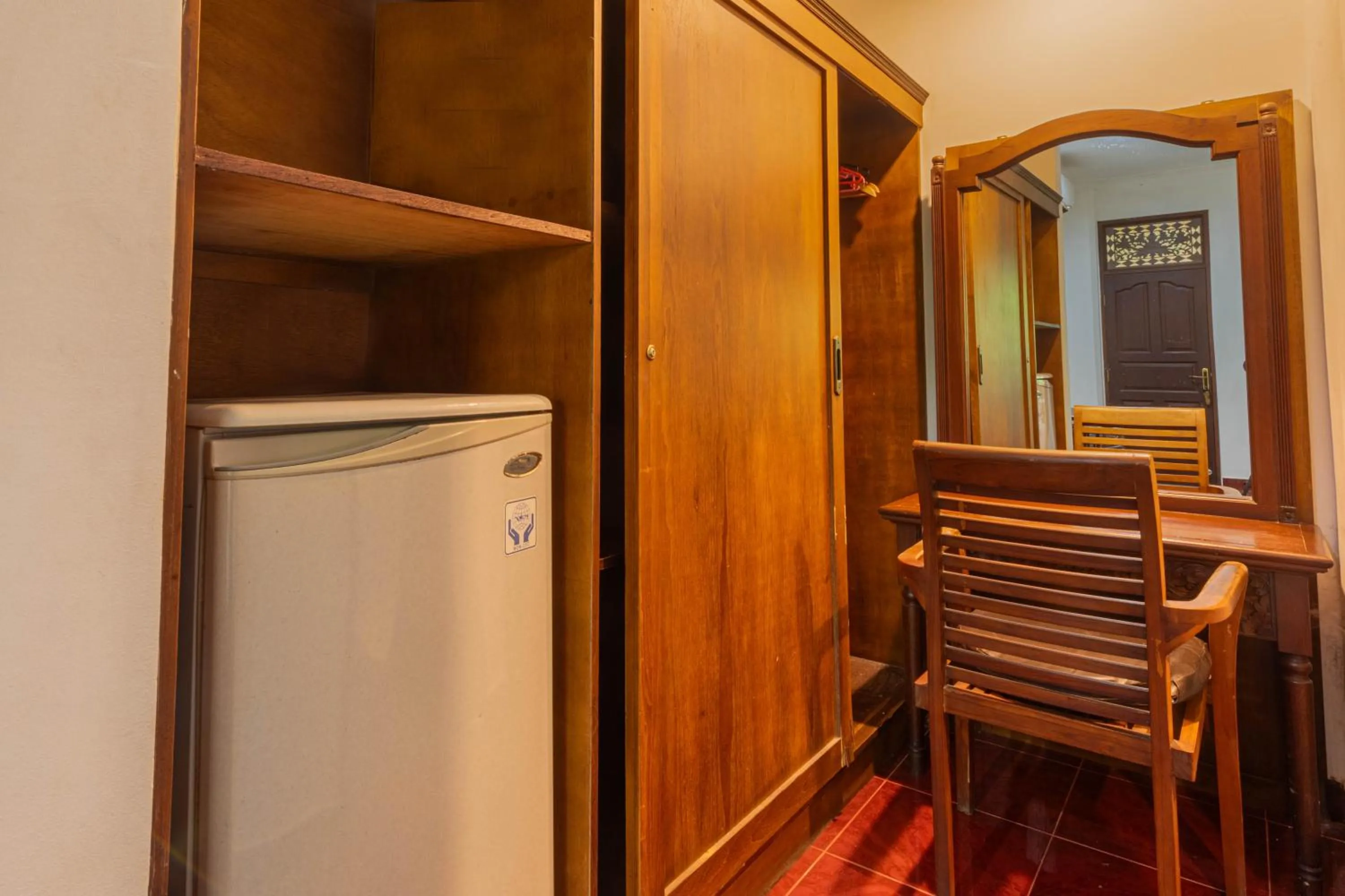 Kitchen or kitchenette in Puri Mango Guest House Sanur