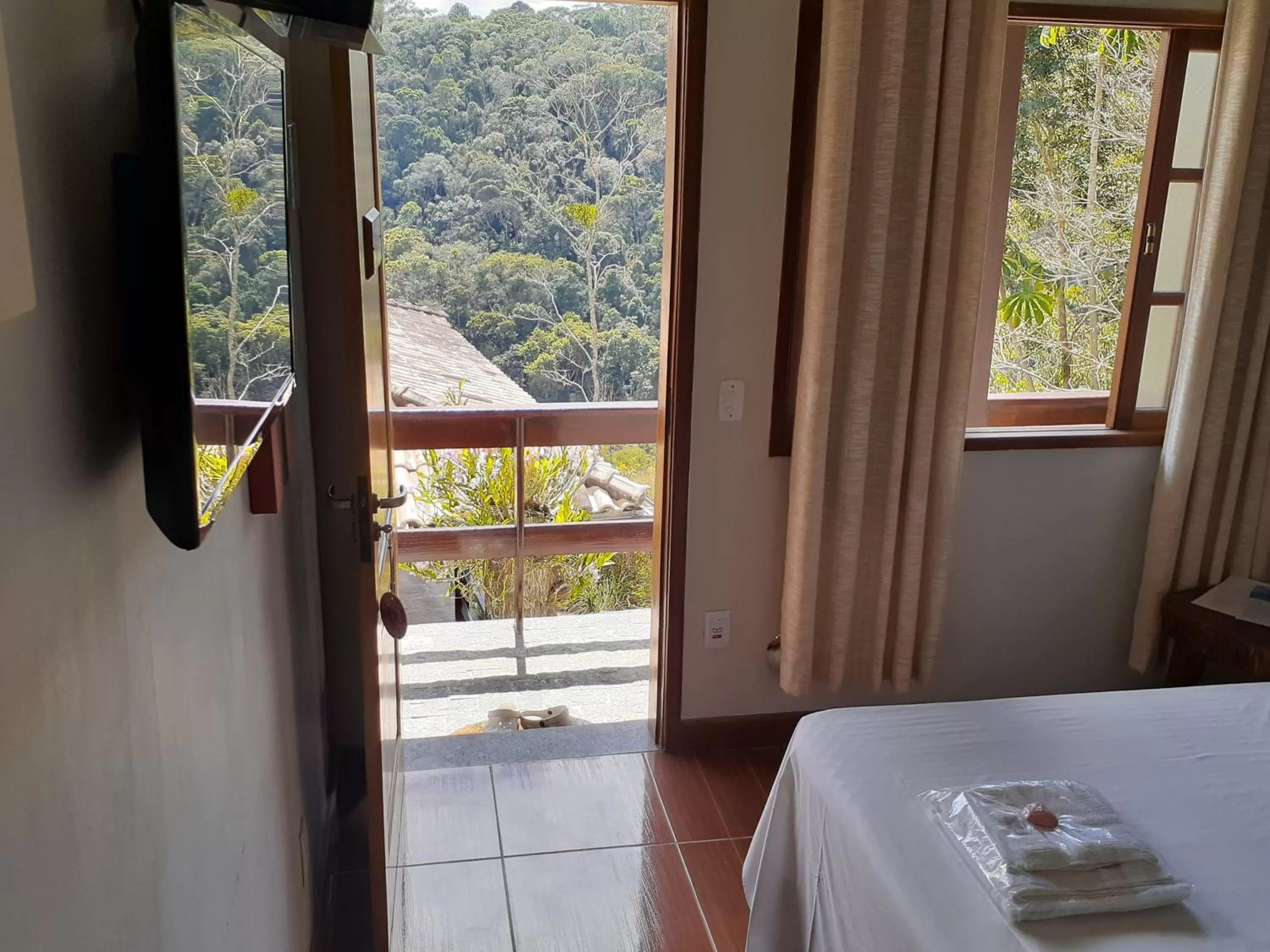 Bed in Pousada R.N.C. Nosso Paraíso