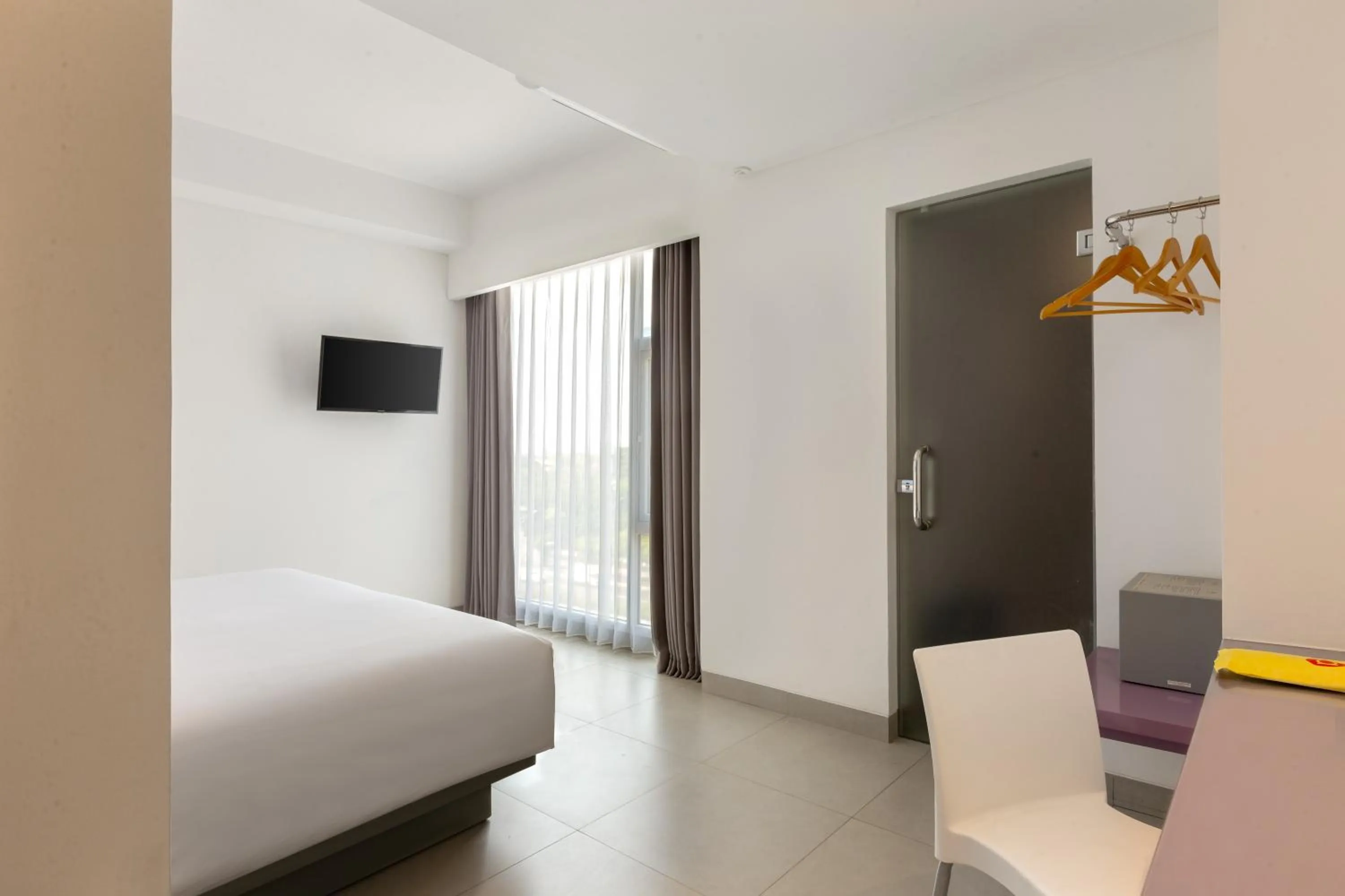 Bed in Amaris Hotel Slipi