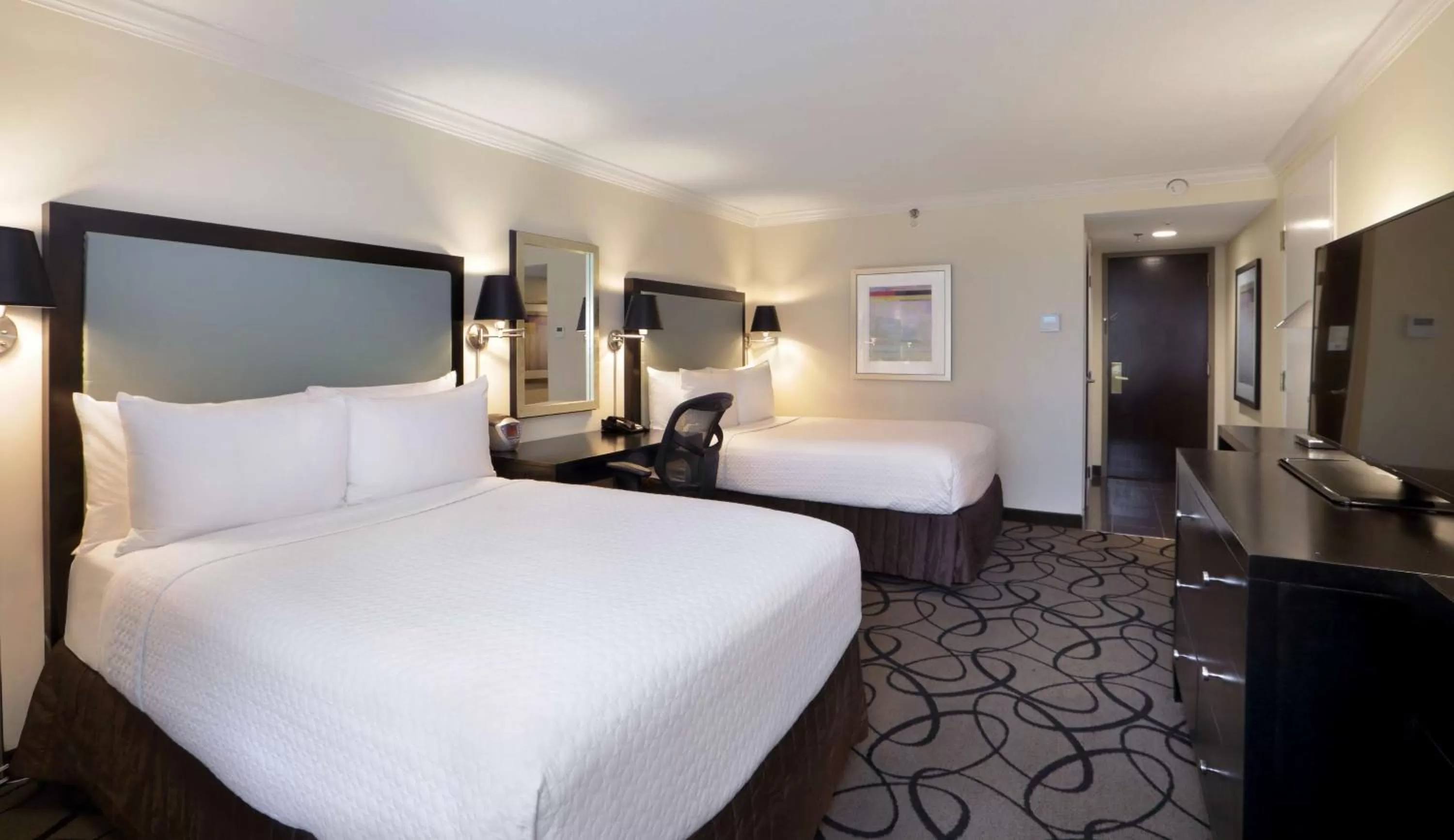 Bed in The Verve Boston Natick, Tapestry Collection by Hilton