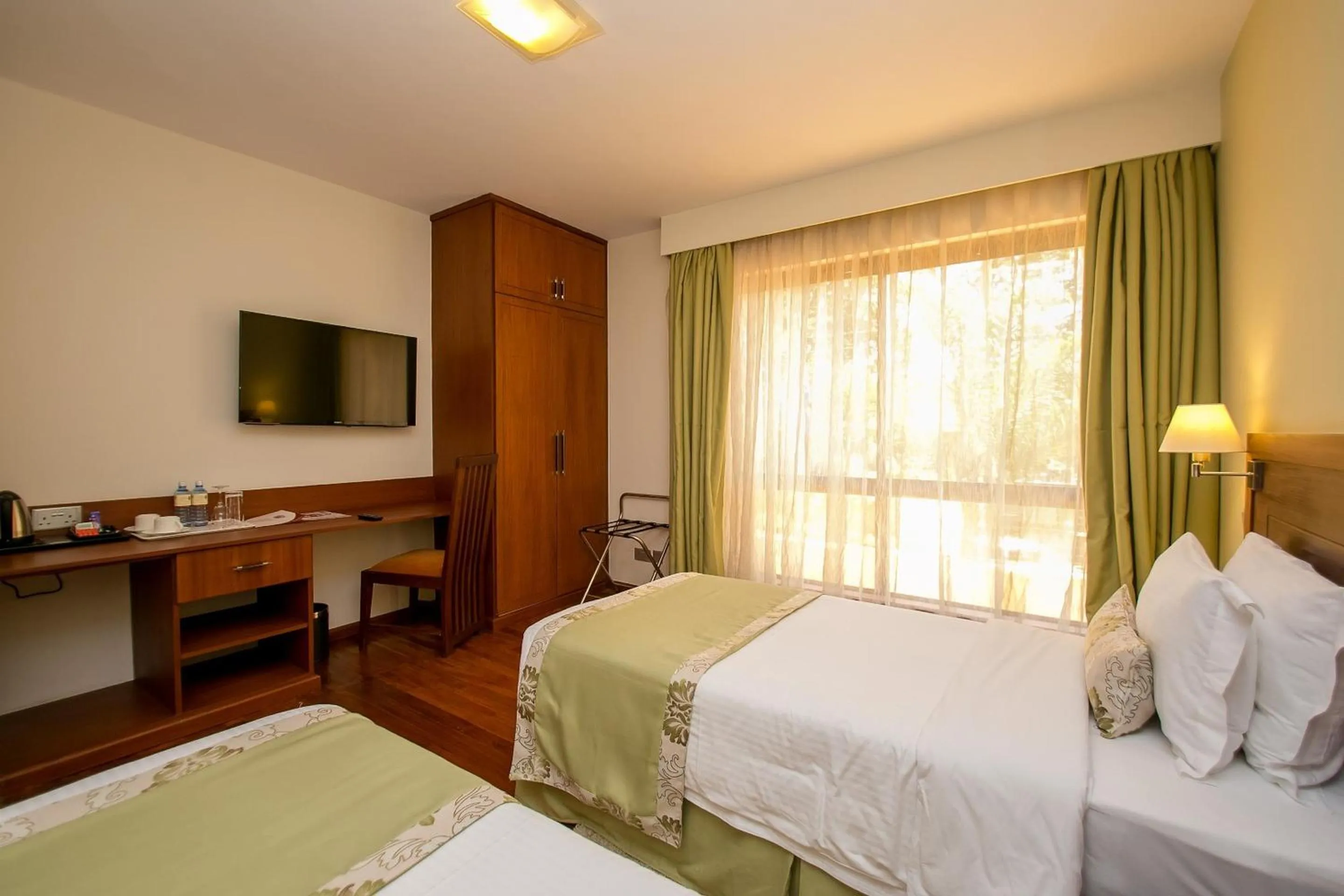 Photo of the whole room, Bed in Waridi Paradise Hotel and Suites