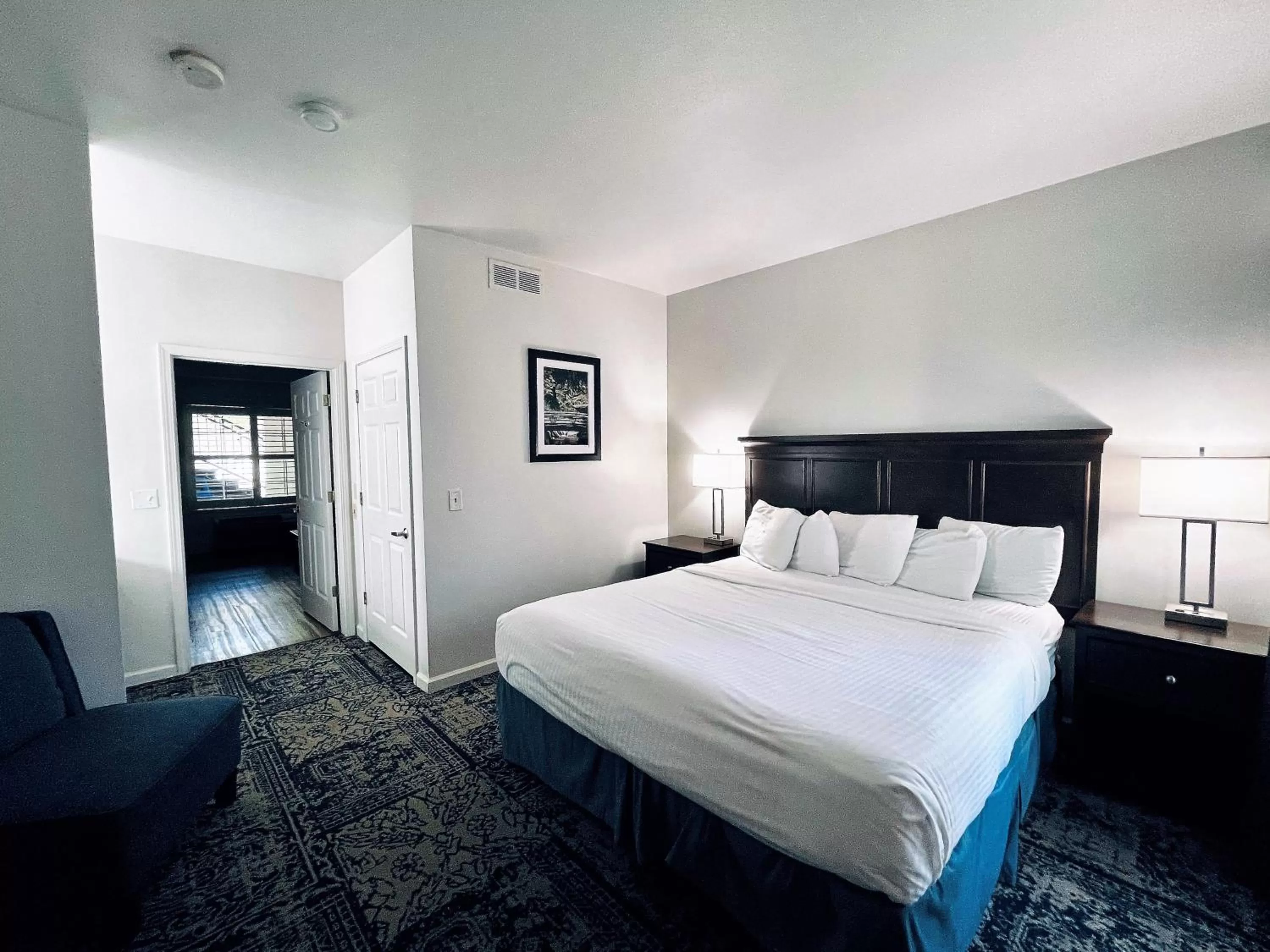 Deluxe King Suite in University Park Inn & Suites, an Ascend Collection Hotel