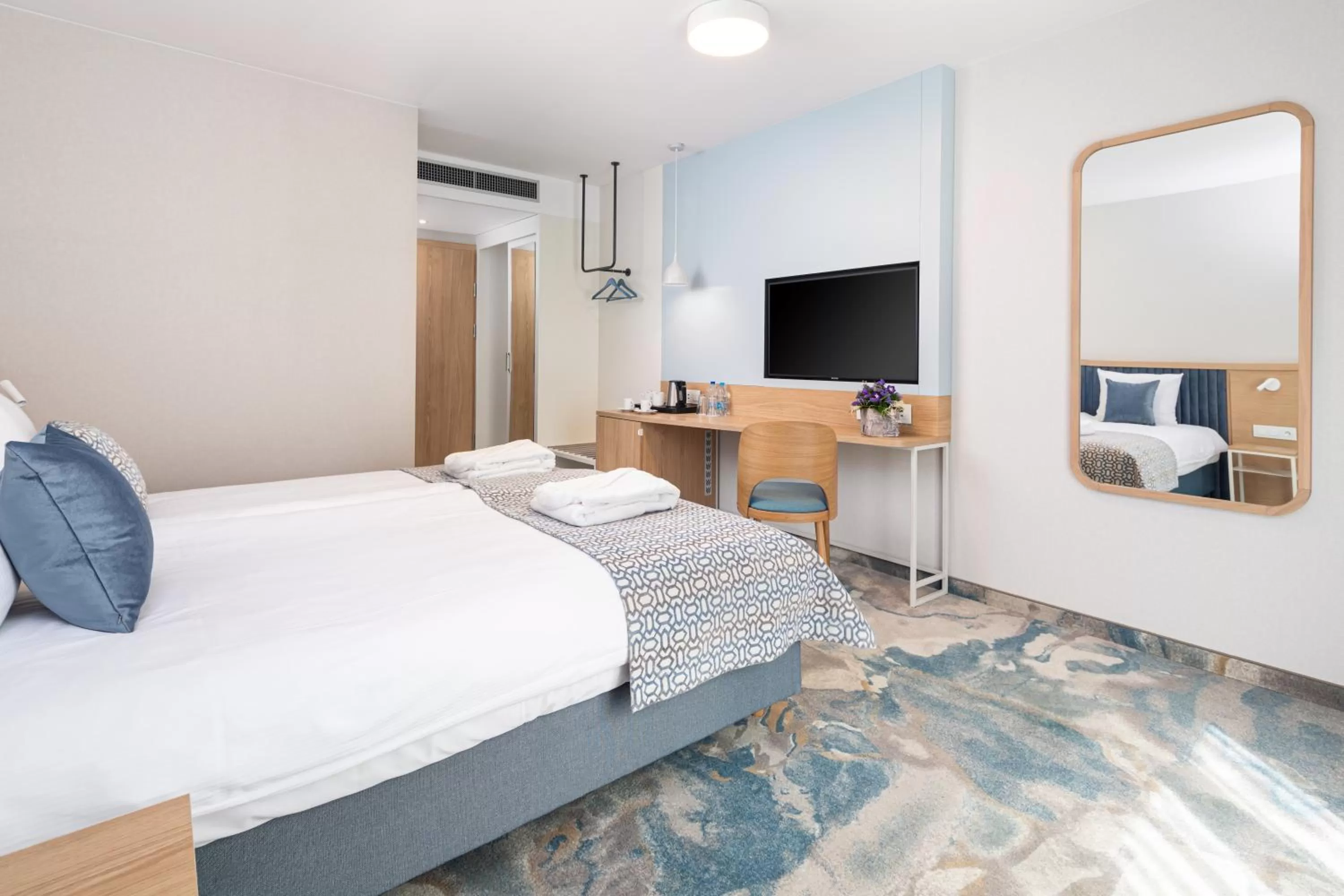 Bed in Maloves Resort & Spa