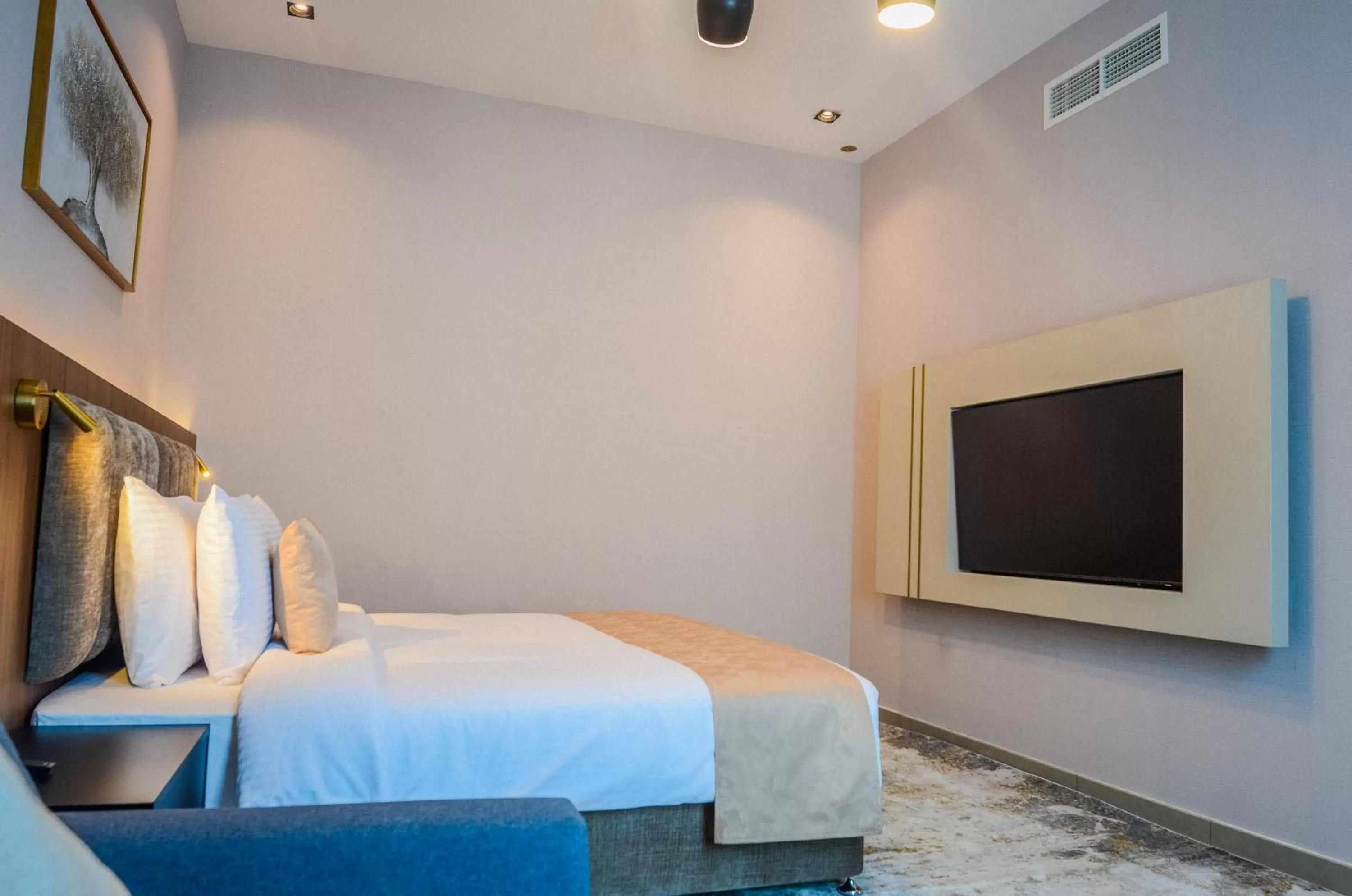 TV and multimedia, Bed in VOGO Grand Hotel Formerly Best Western Plus Hotel Dubai Academic City