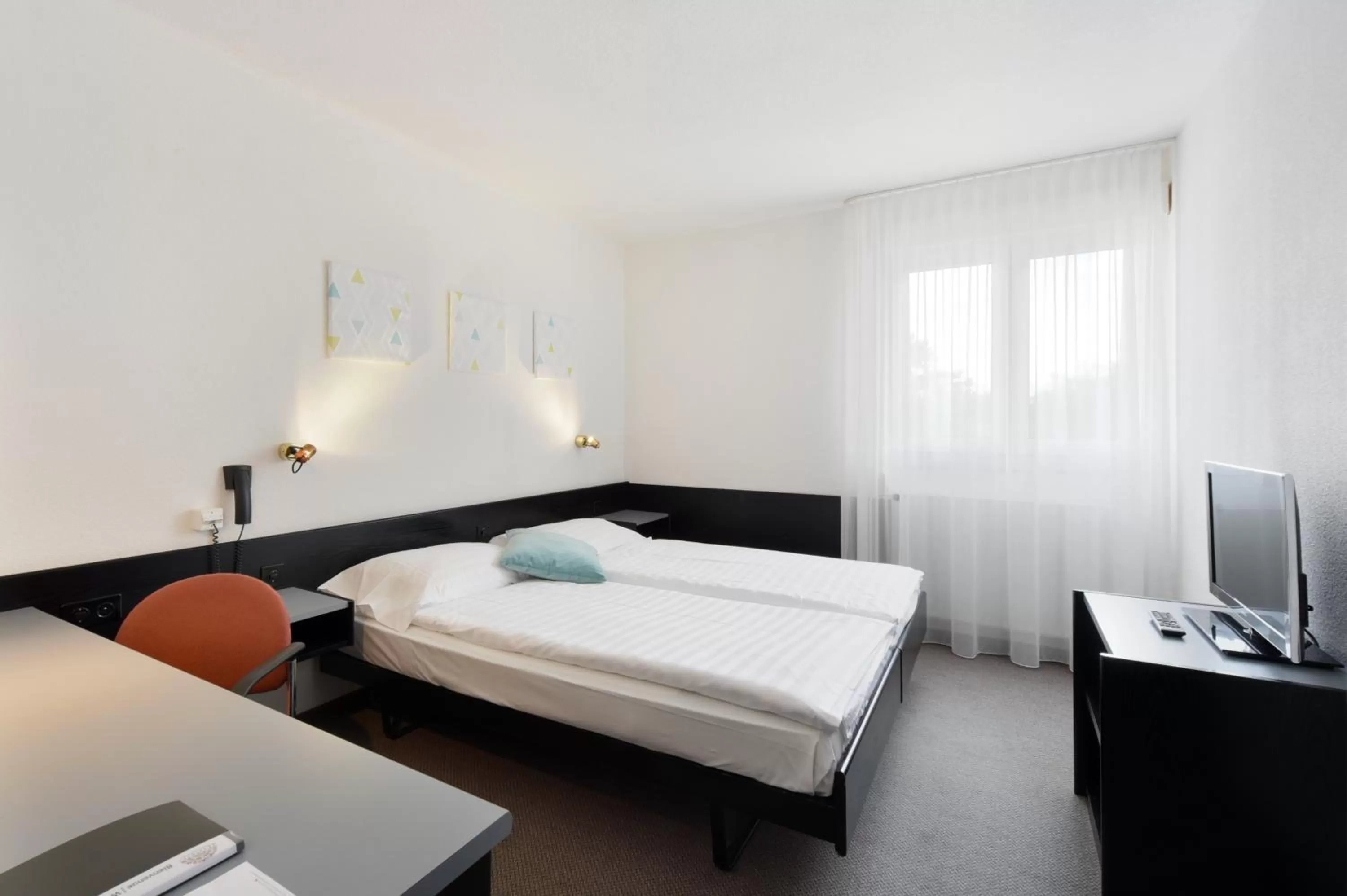 Bed in Hôtel des Mosaiques