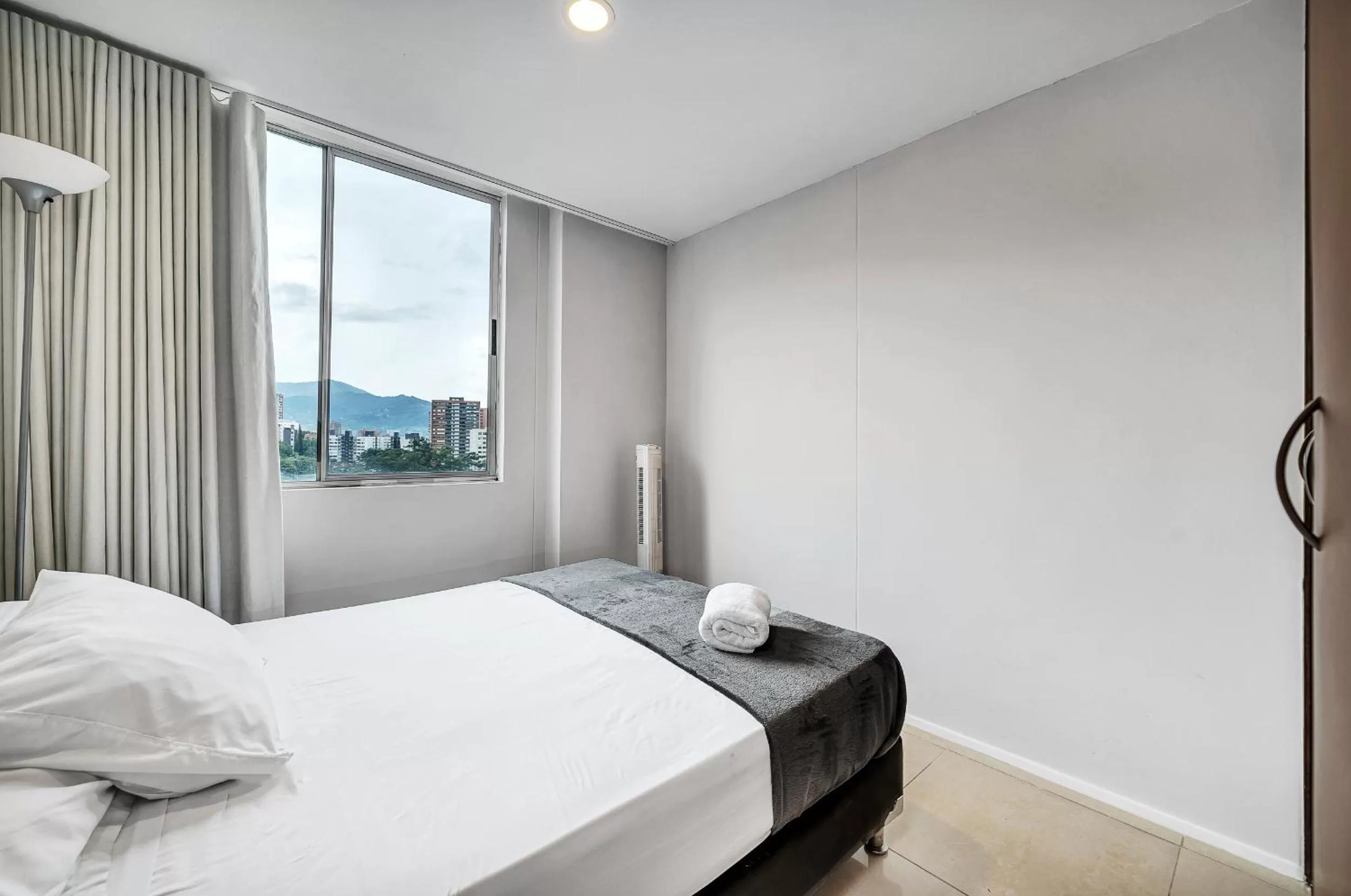 Bedroom, Bed in Apartamentos Poblado Alejandría by HOUSY HOST