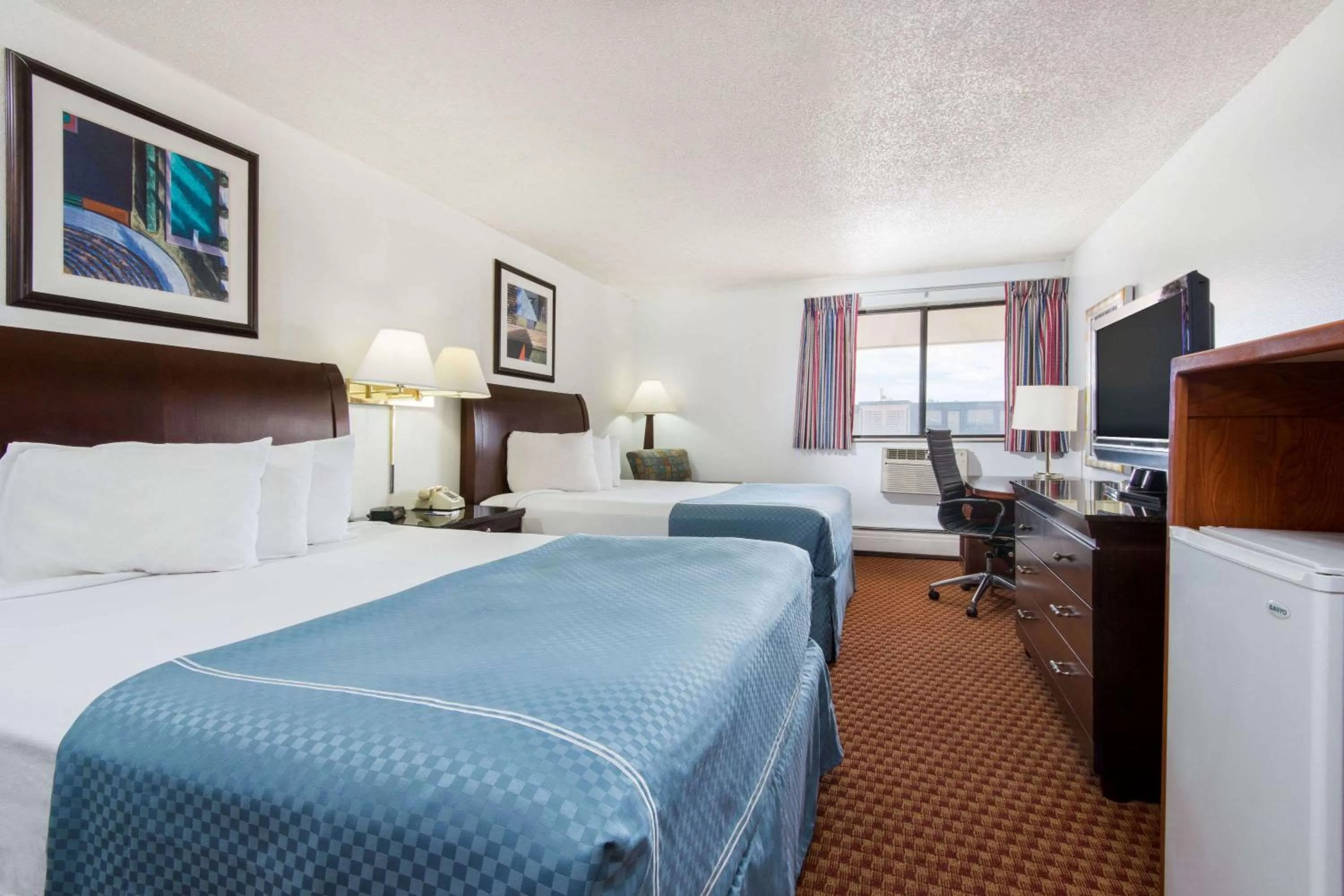 Photo of the whole room, Bed in Travelodge by Wyndham Laramie
