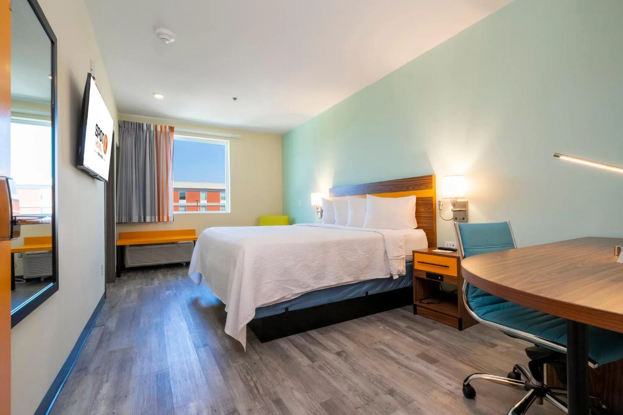 Photo of the whole room, Bed in SPOT X Hotel Orlando Intl Dr by The Red Collection