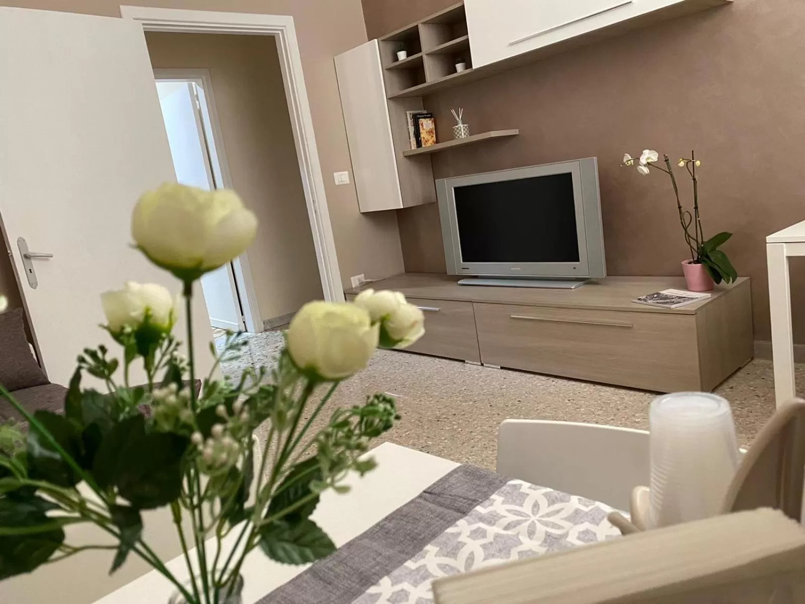 Communal lounge/ TV room in B&B Domus D'Italia