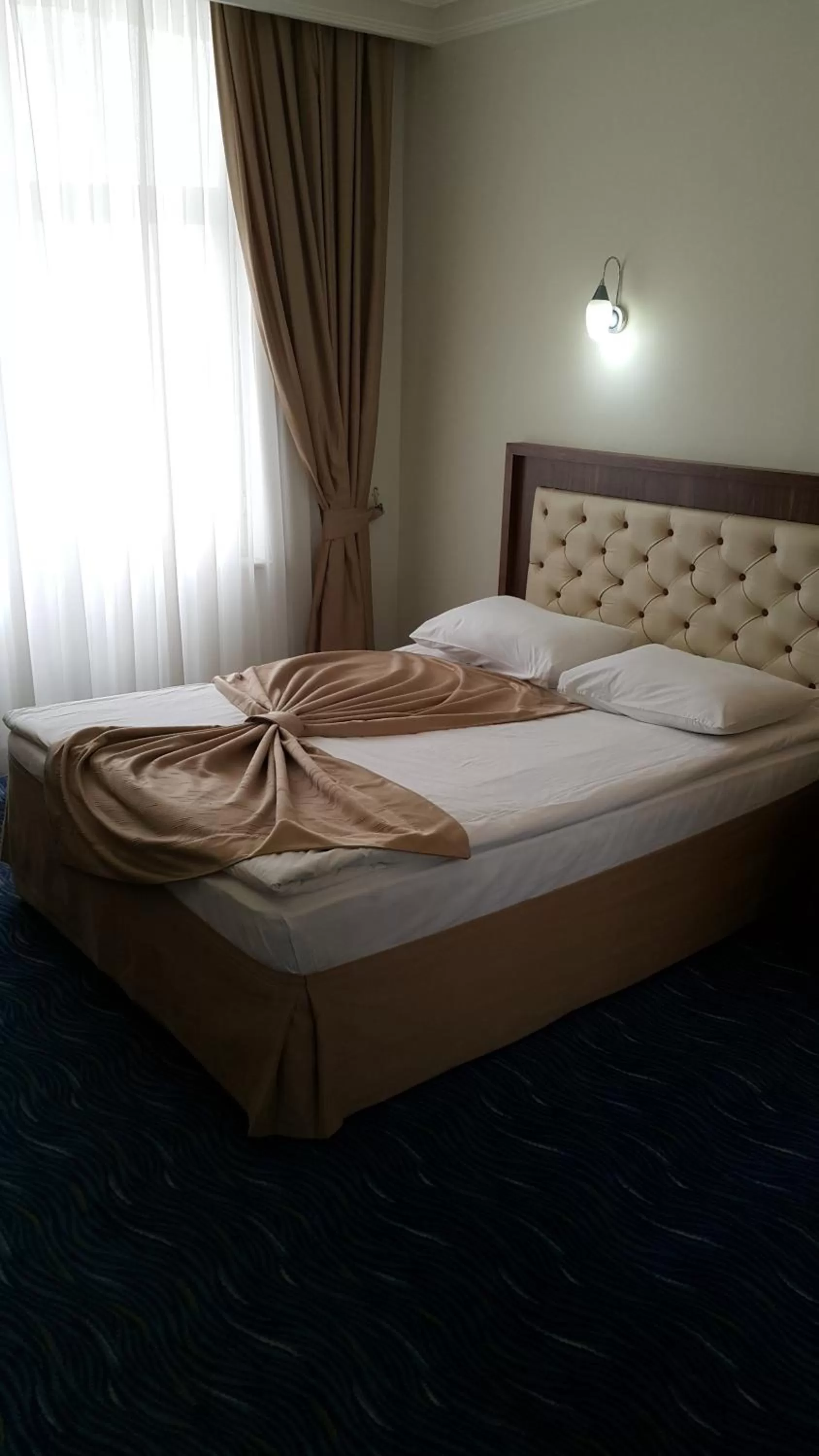 Living room, Bed in Miroglu Hotel