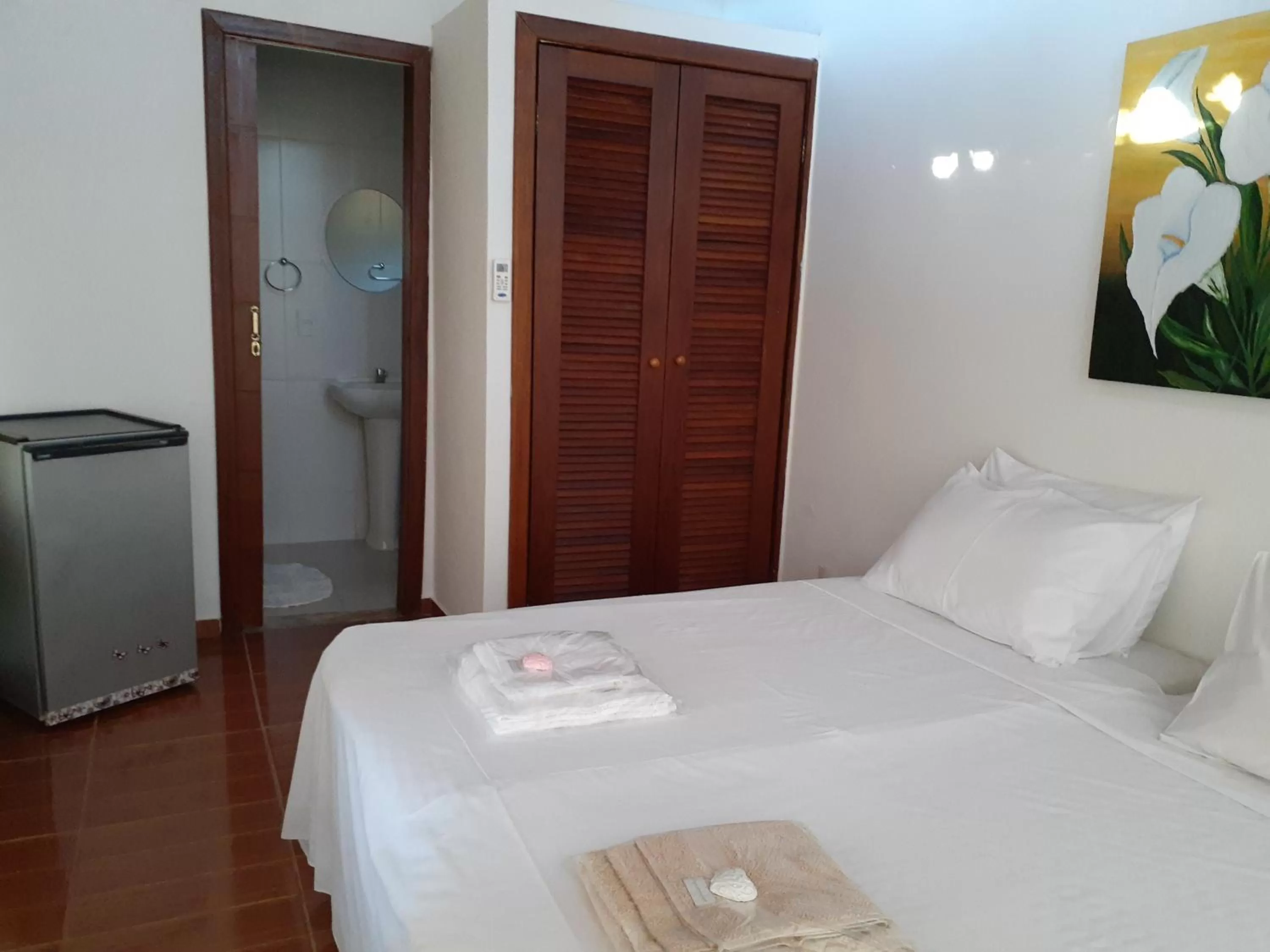 Bed in Pousada R.N.C. Nosso Paraíso