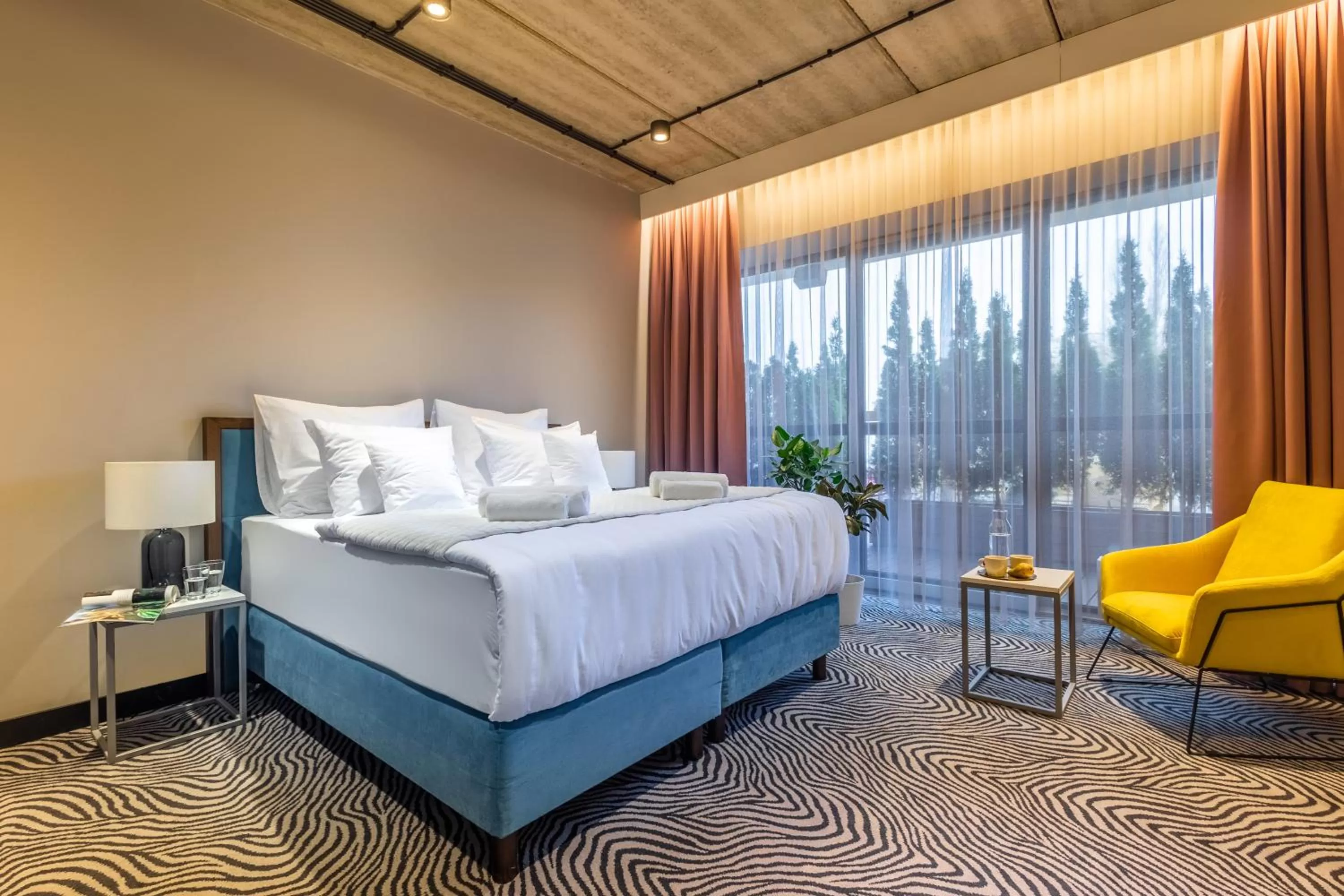 Bed in Hotel Zoo by Afrykarium Wroclaw