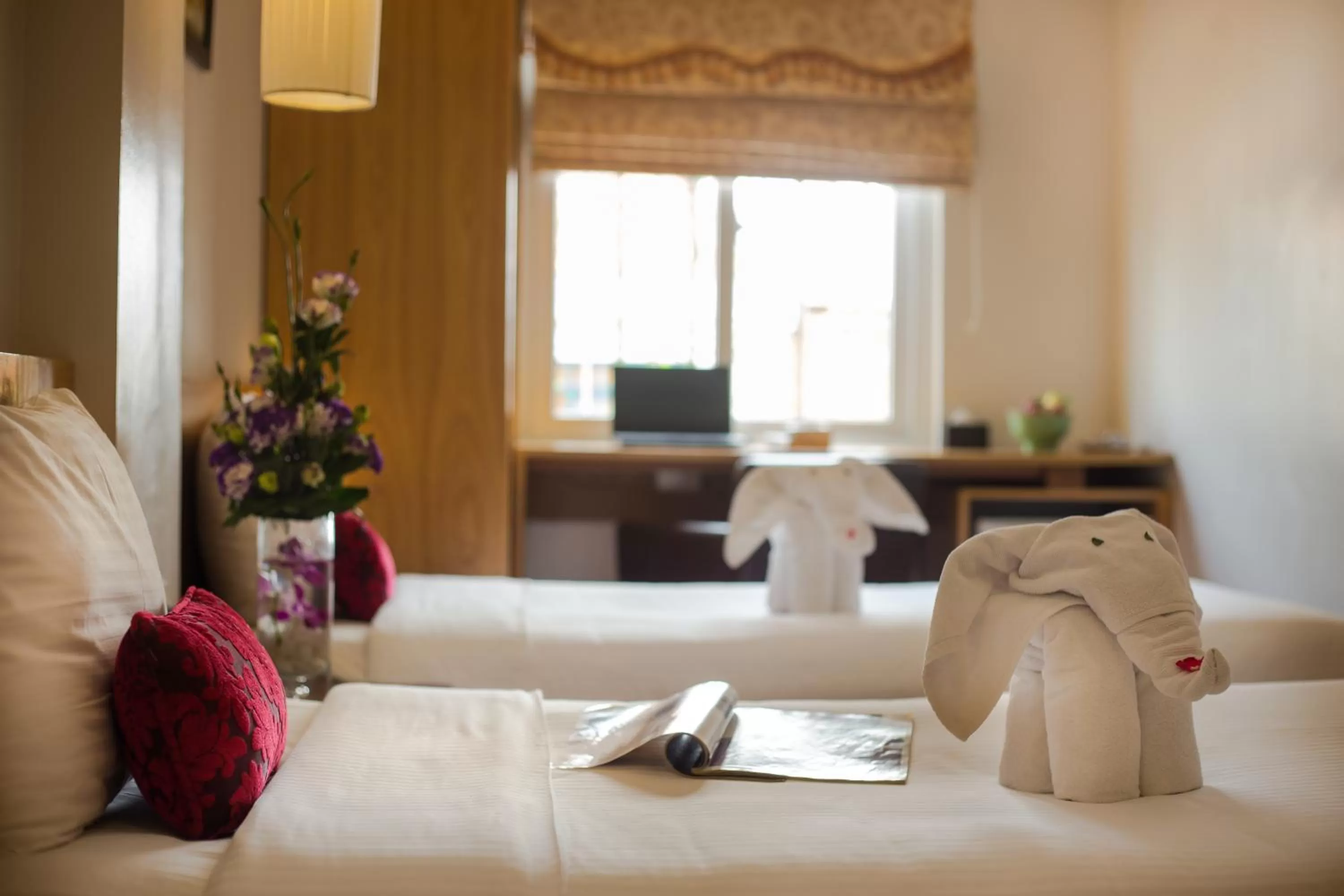 Bed in Eliana Ruby Hotel & Travel