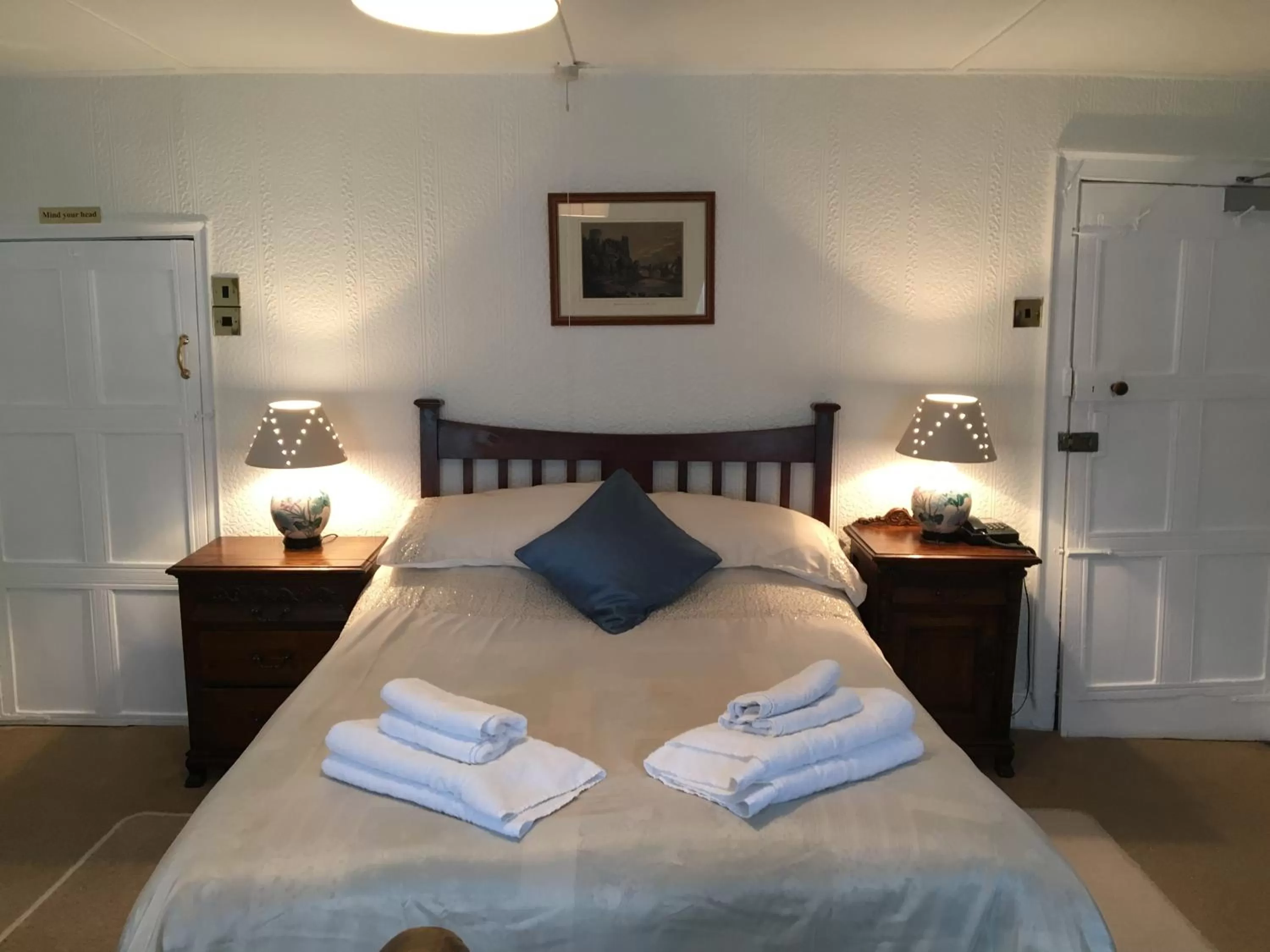 Bed in The Old Well Inn