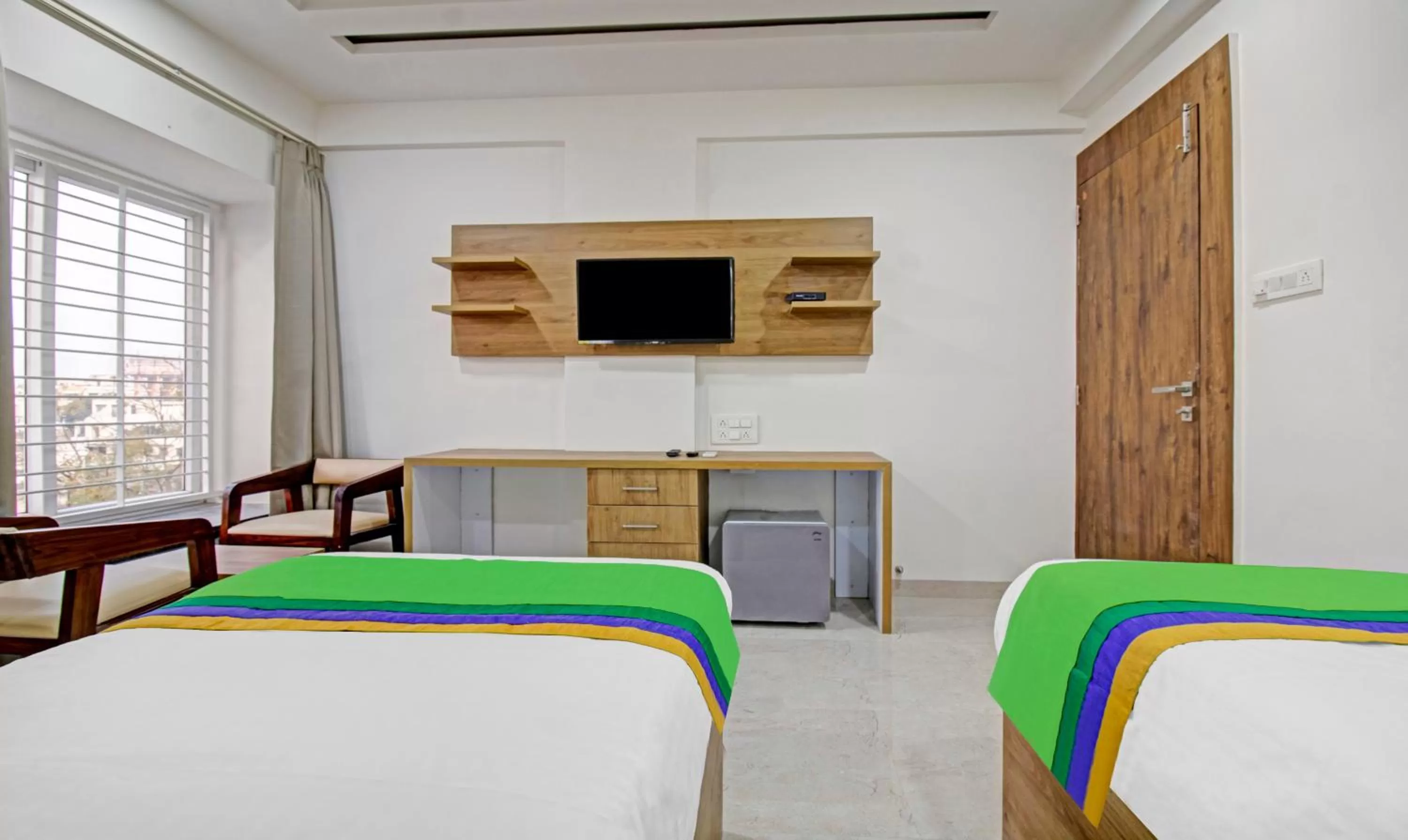 Bedroom, Bed in Treebo Chandraprasth Residency