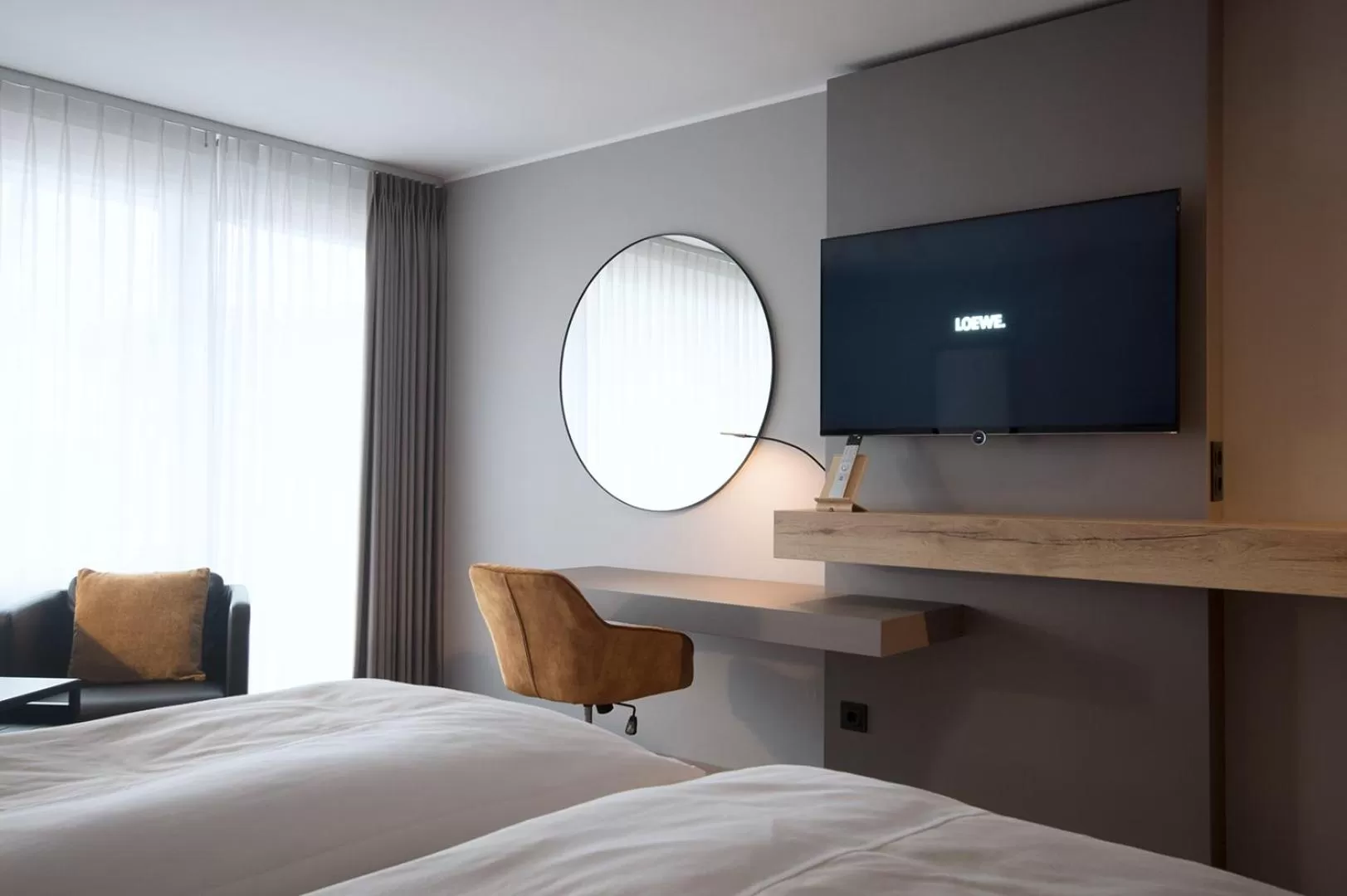 Communal lounge/ TV room, Bed in Am Berghang