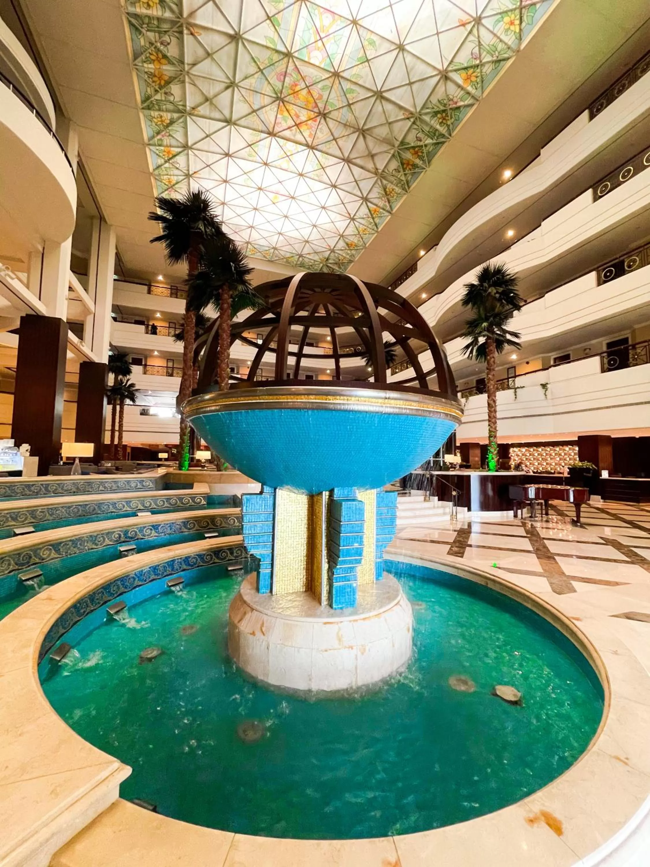 Lobby or reception in Mövenpick Grand Al Bustan