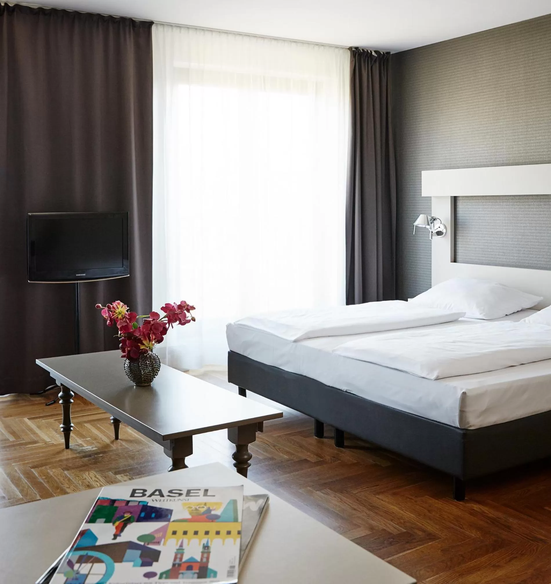 Bed in Hotel AMANO Rooms & Apartments